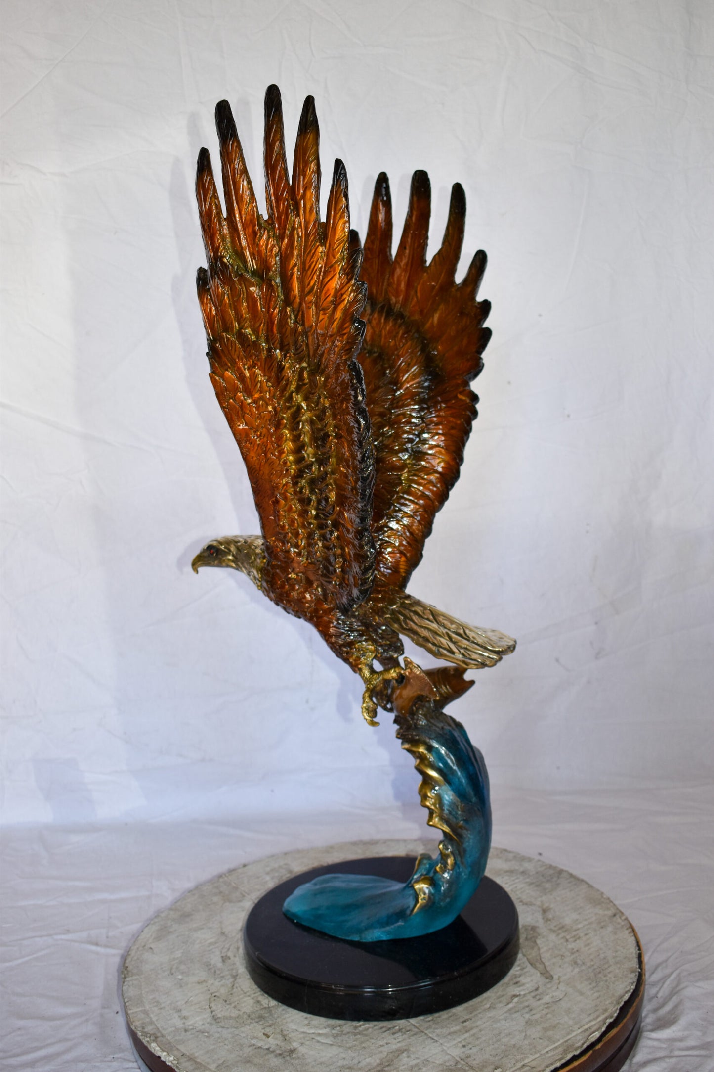 Eagle In Action Catching a Fish from Water Bronze Statue Size: 18" x 17" x 37"H