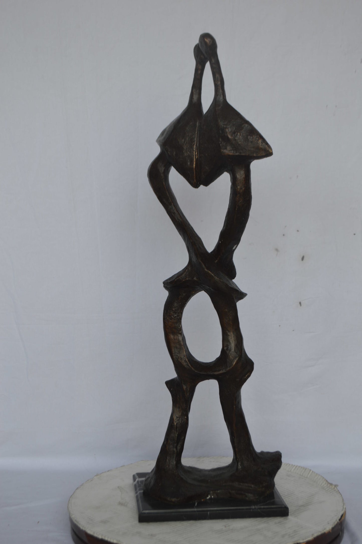 Modern art abstract, a couple kissing bronze statue - Size: 13"L x 11"W x 40"H.