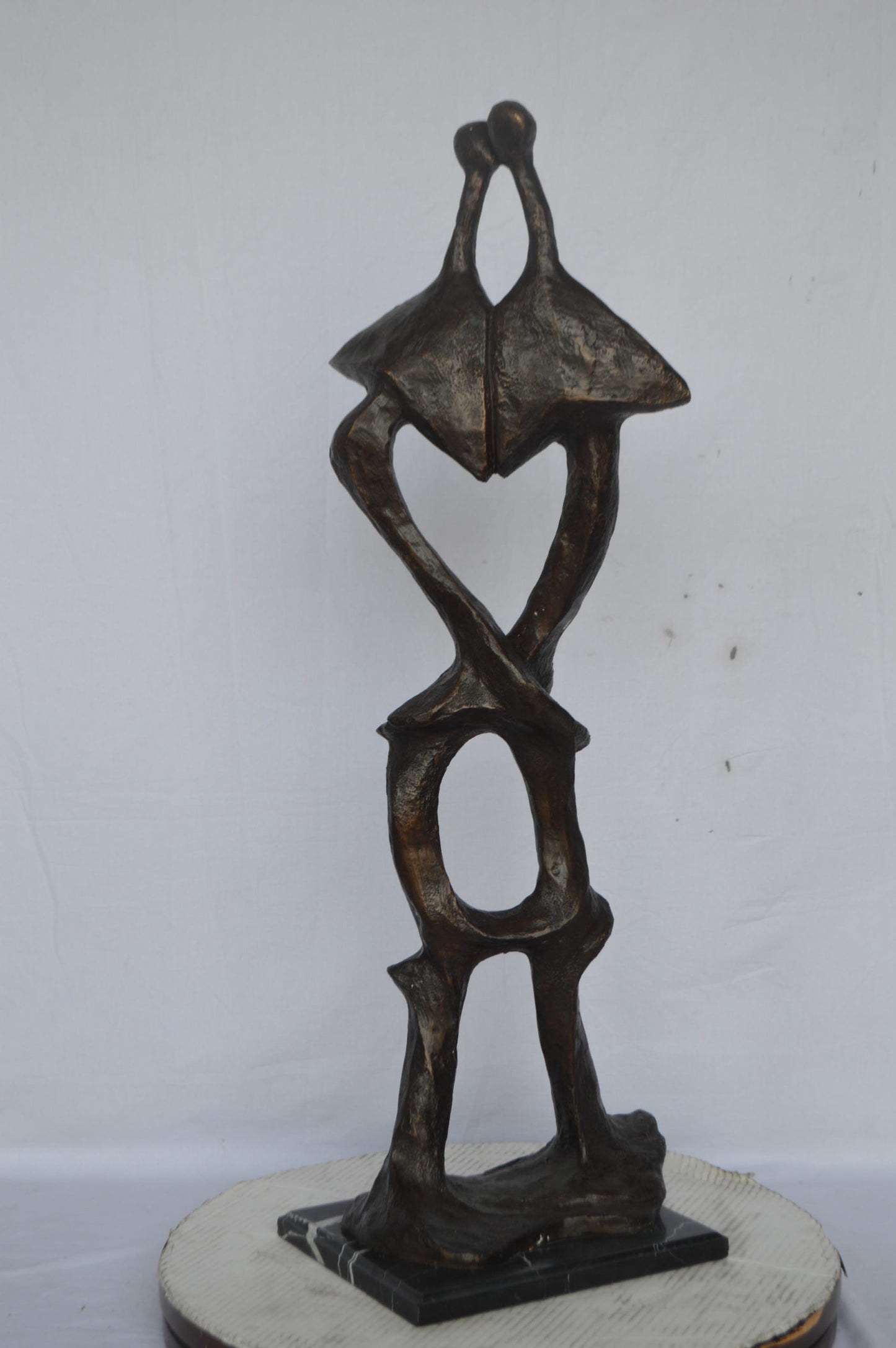 Modern art abstract, a couple kissing bronze statue - Size: 13"L x 11"W x 40"H.