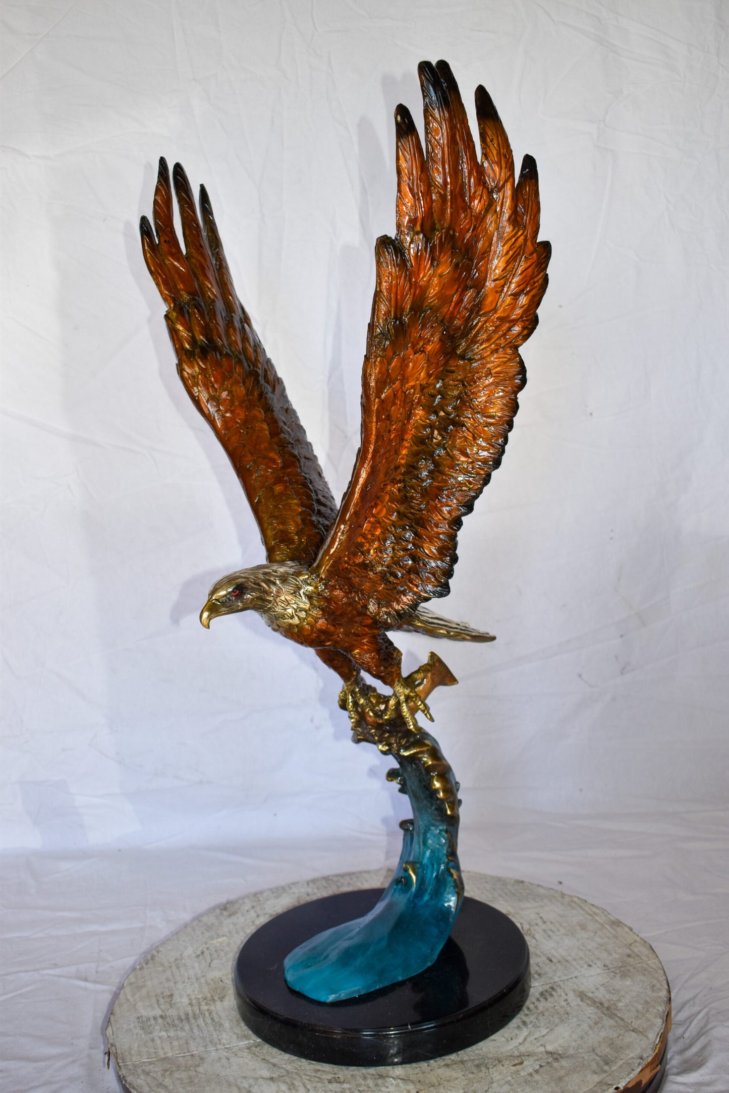 Eagle In Action Catching a Fish from Water Bronze Statue Size: 18" x 17" x 37"H