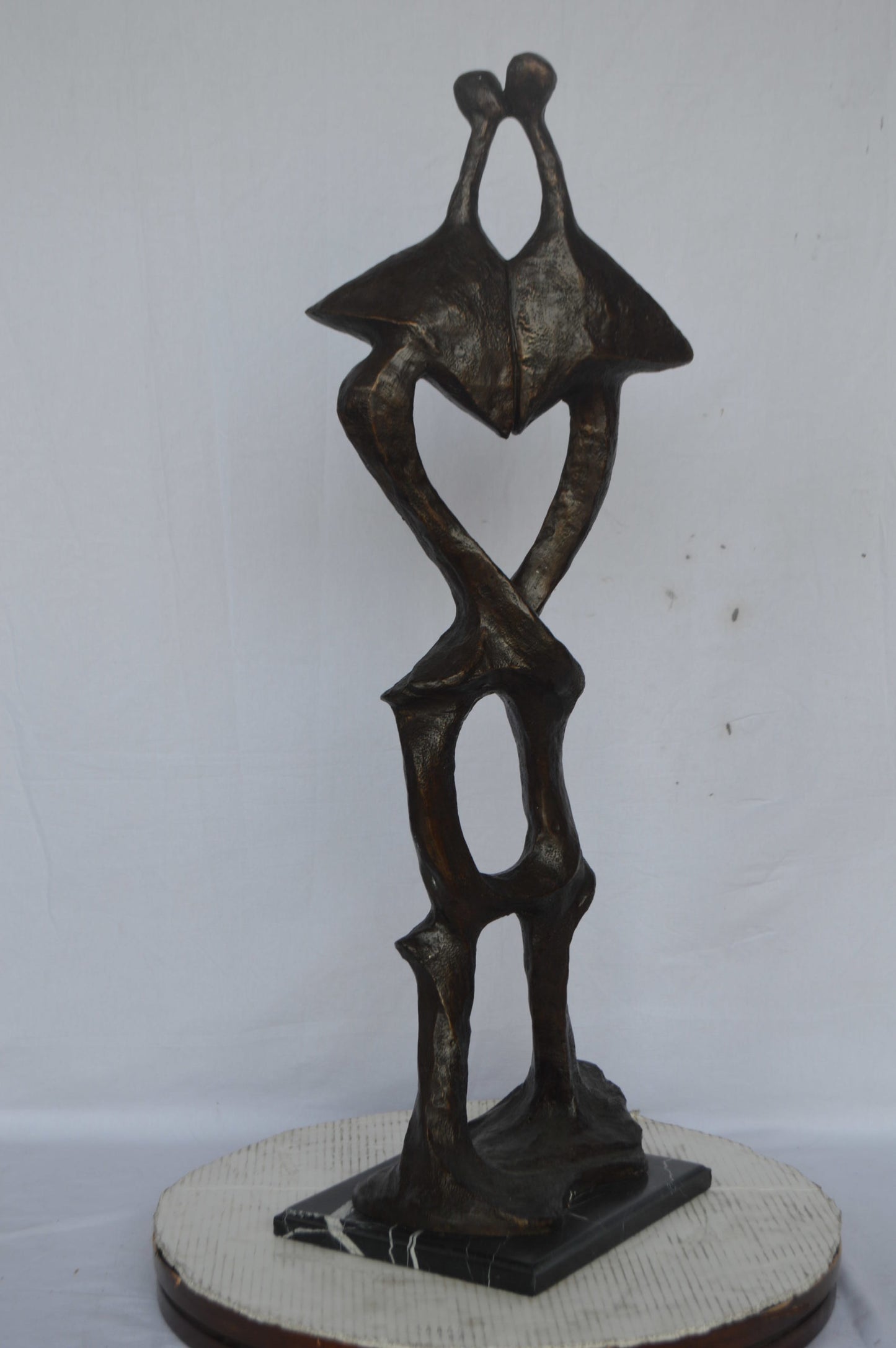 Modern art abstract, a couple kissing bronze statue - Size: 13"L x 11"W x 40"H.