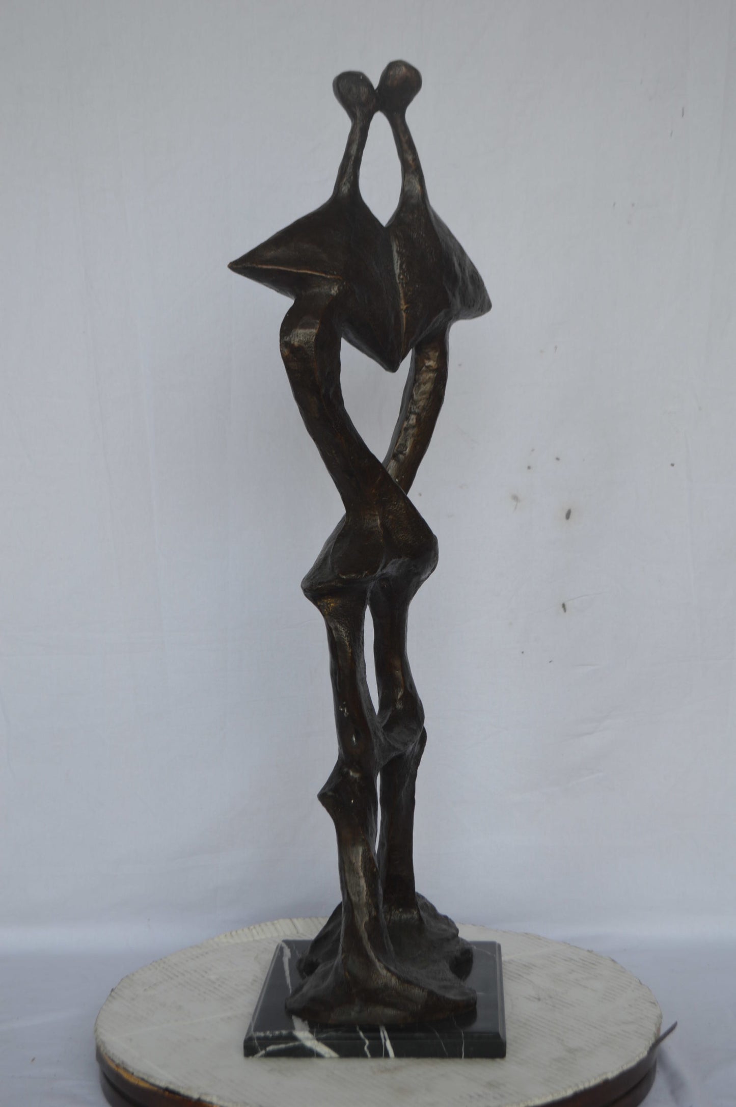 Modern art abstract, a couple kissing bronze statue - Size: 13"L x 11"W x 40"H.
