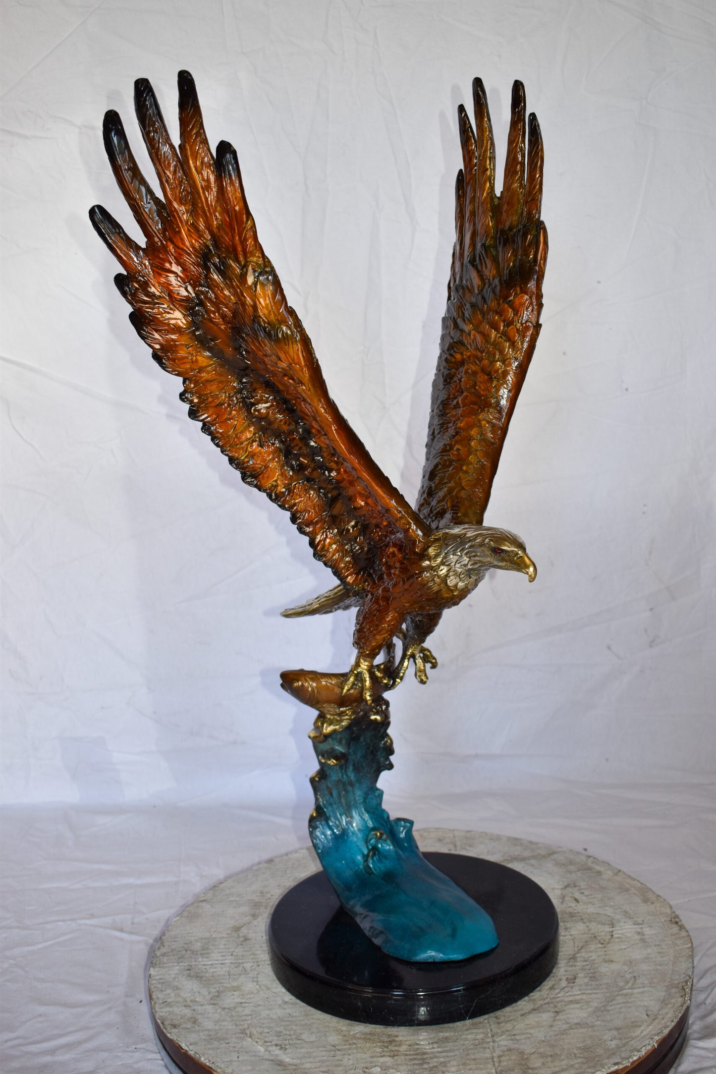Eagle In Action Catching a Fish from Water Bronze Statue Size: 18" x 17" x 37"H