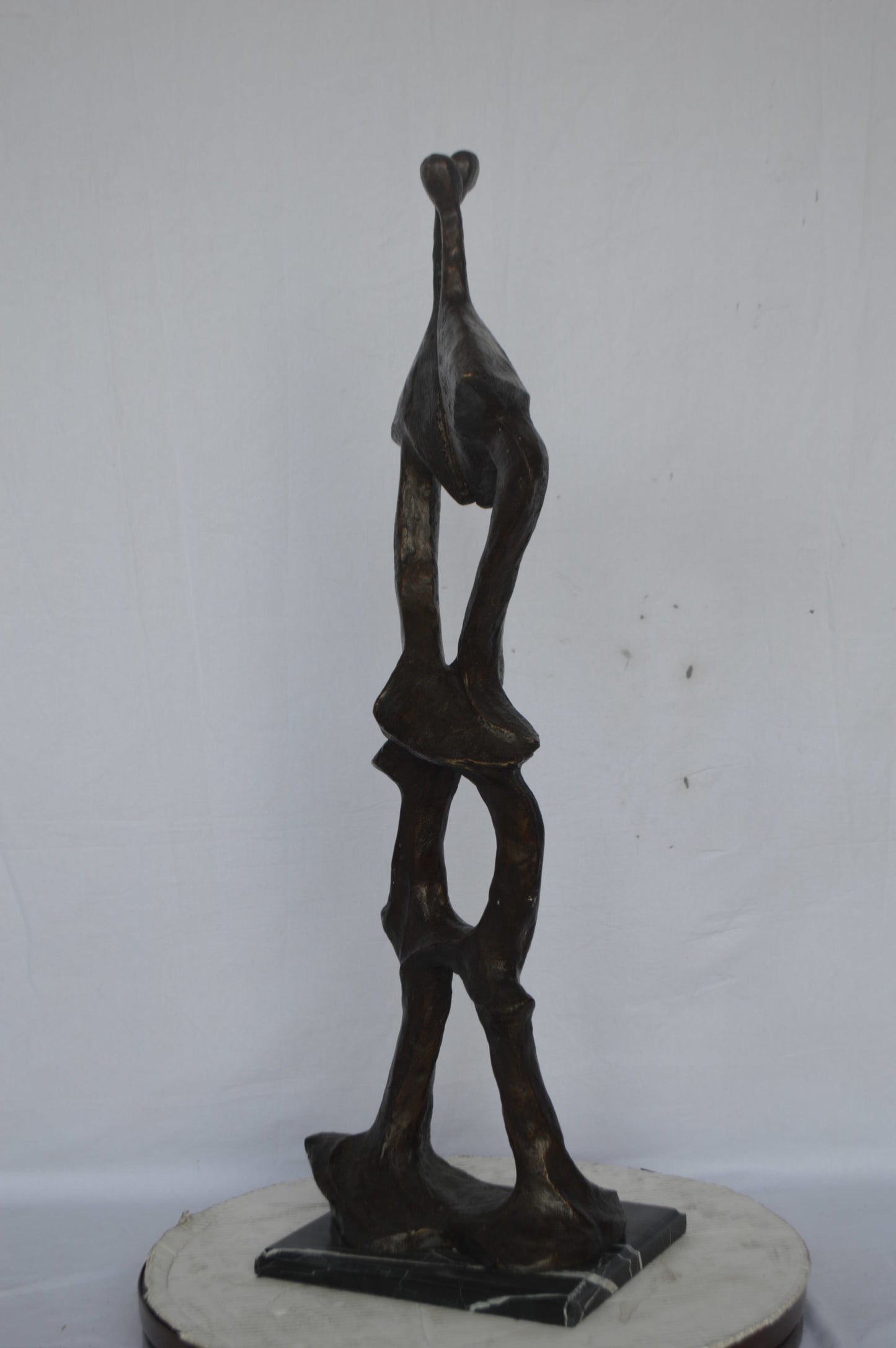Modern art abstract, a couple kissing bronze statue - Size: 13"L x 11"W x 40"H.
