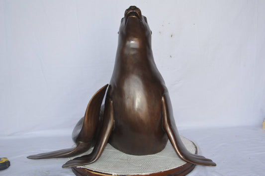 Seal Fountain made of bronze statue - Size: 35"L x 24"W x 27"H.
