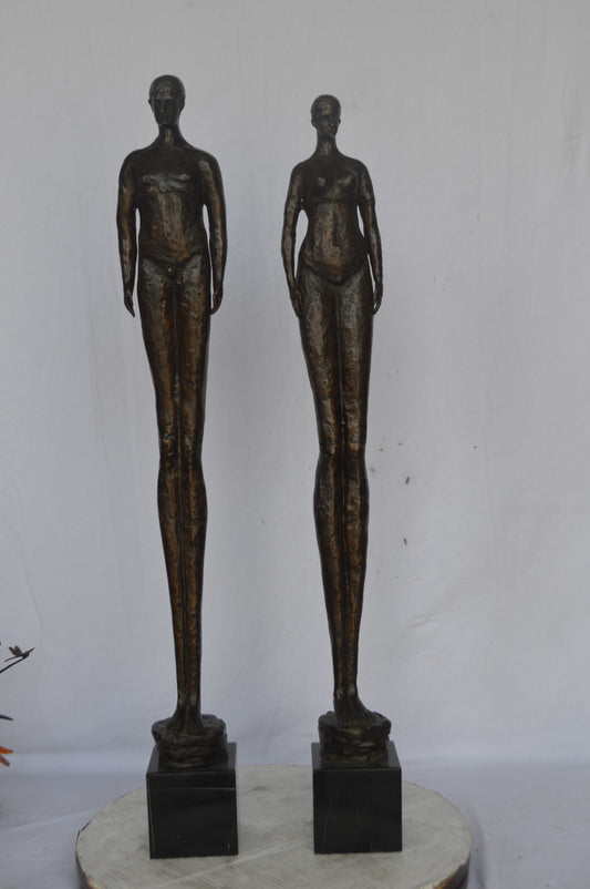 Modern art Pair, tall couple standing bronze statue - Size: 5"L x 5"W x 45"H.