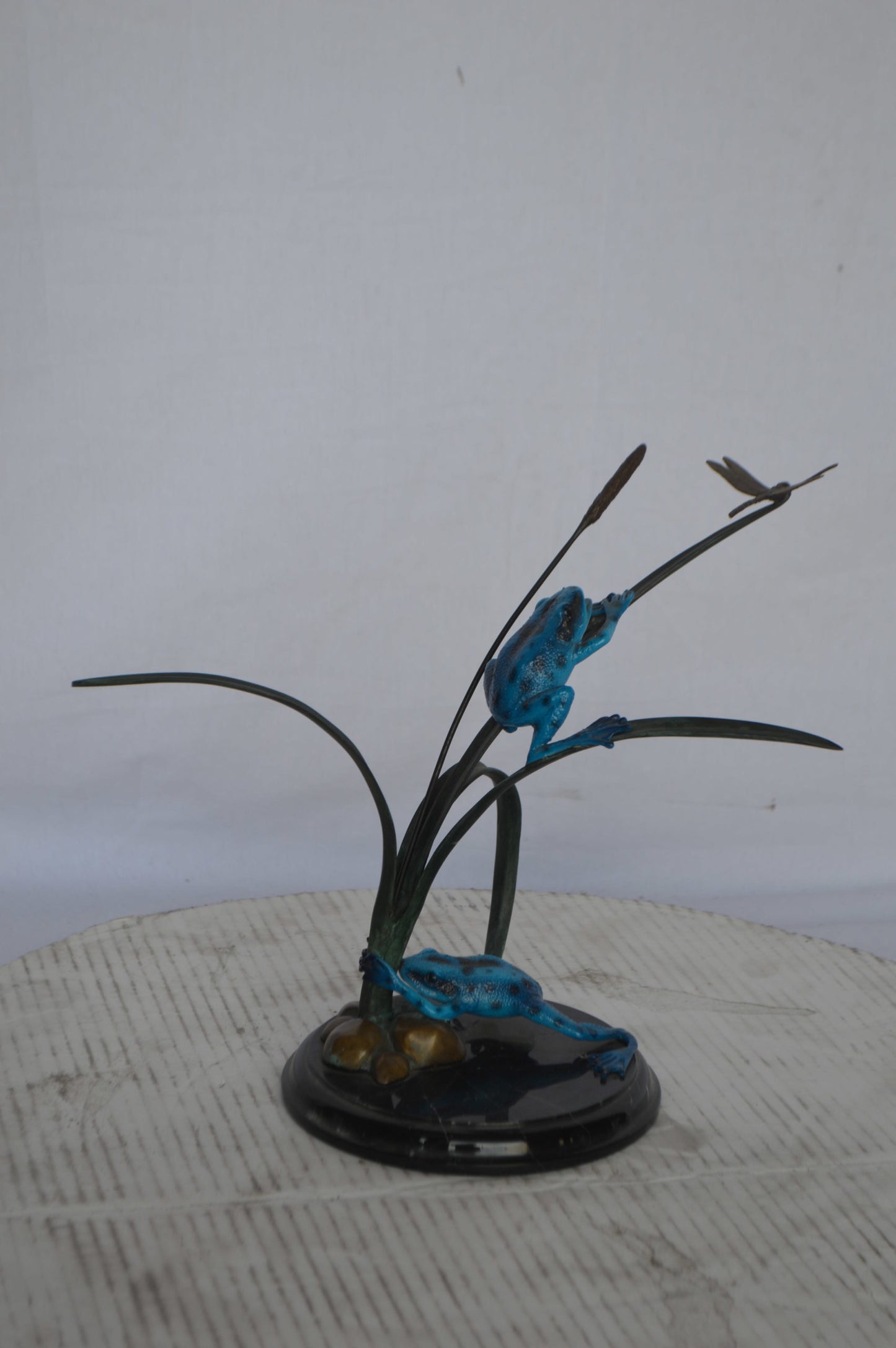 Two Blue Frogs catching a dragonfly Bronze Statue - Size: 14"L x 8"W x 12"H.