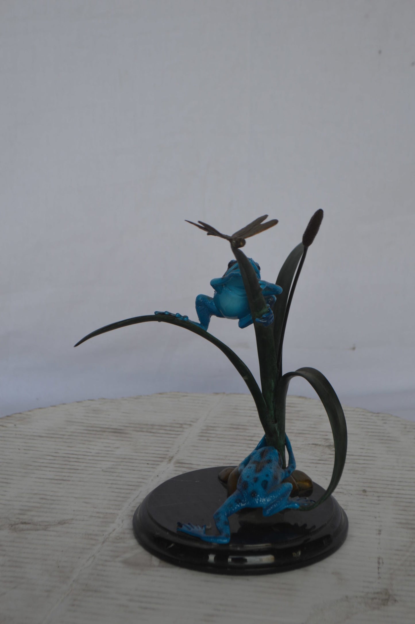 Two Blue Frogs catching a dragonfly Bronze Statue - Size: 14"L x 8"W x 12"H.