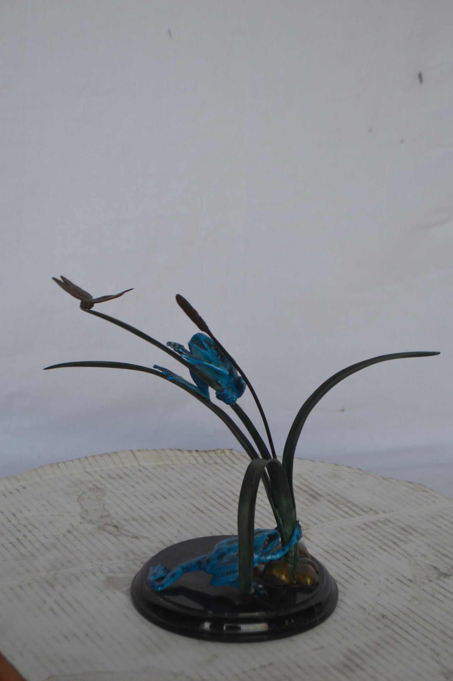 Two Blue Frogs catching a dragonfly Bronze Statue - Size: 14"L x 8"W x 12"H.