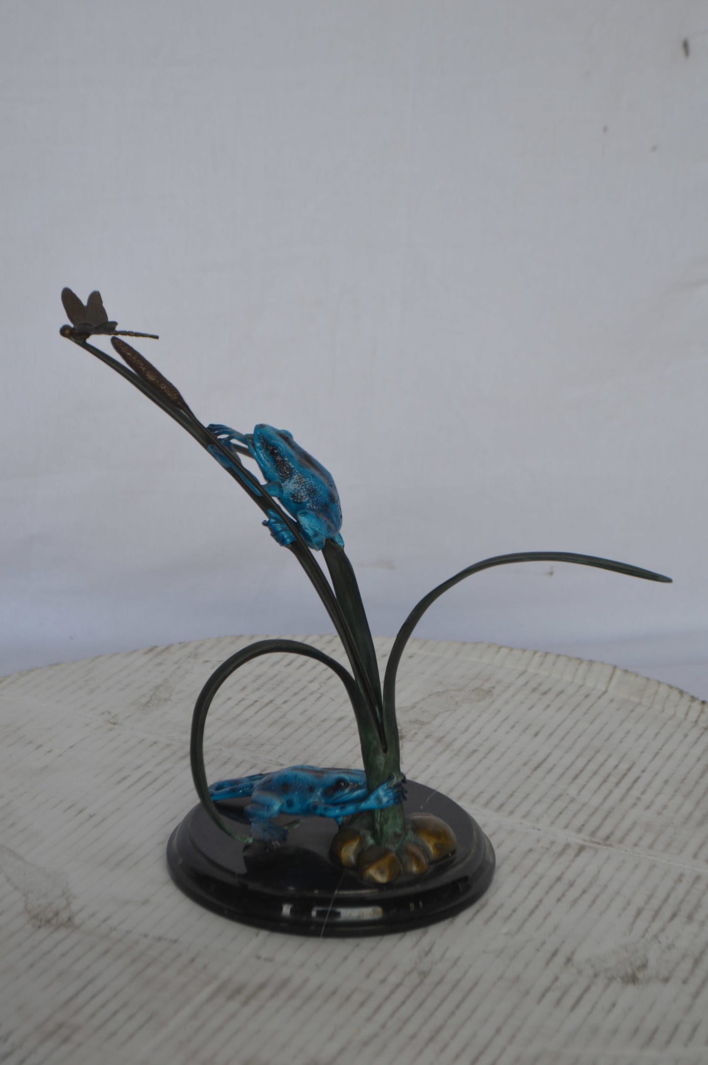 Two Blue Frogs catching a dragonfly Bronze Statue - Size: 14"L x 8"W x 12"H.