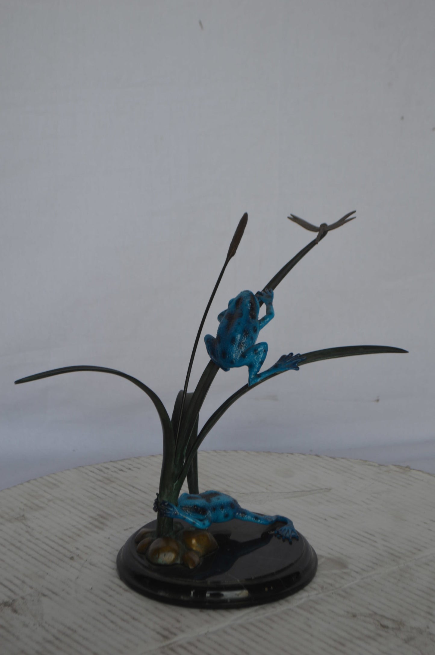 Two Blue Frogs catching a dragonfly Bronze Statue - Size: 14"L x 8"W x 12"H.