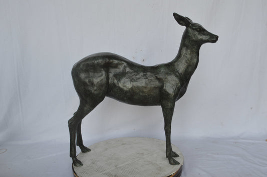 Doe - Baby Deer Green patina Bronze Statue - Size: 30"L x 8"W x 31"H.