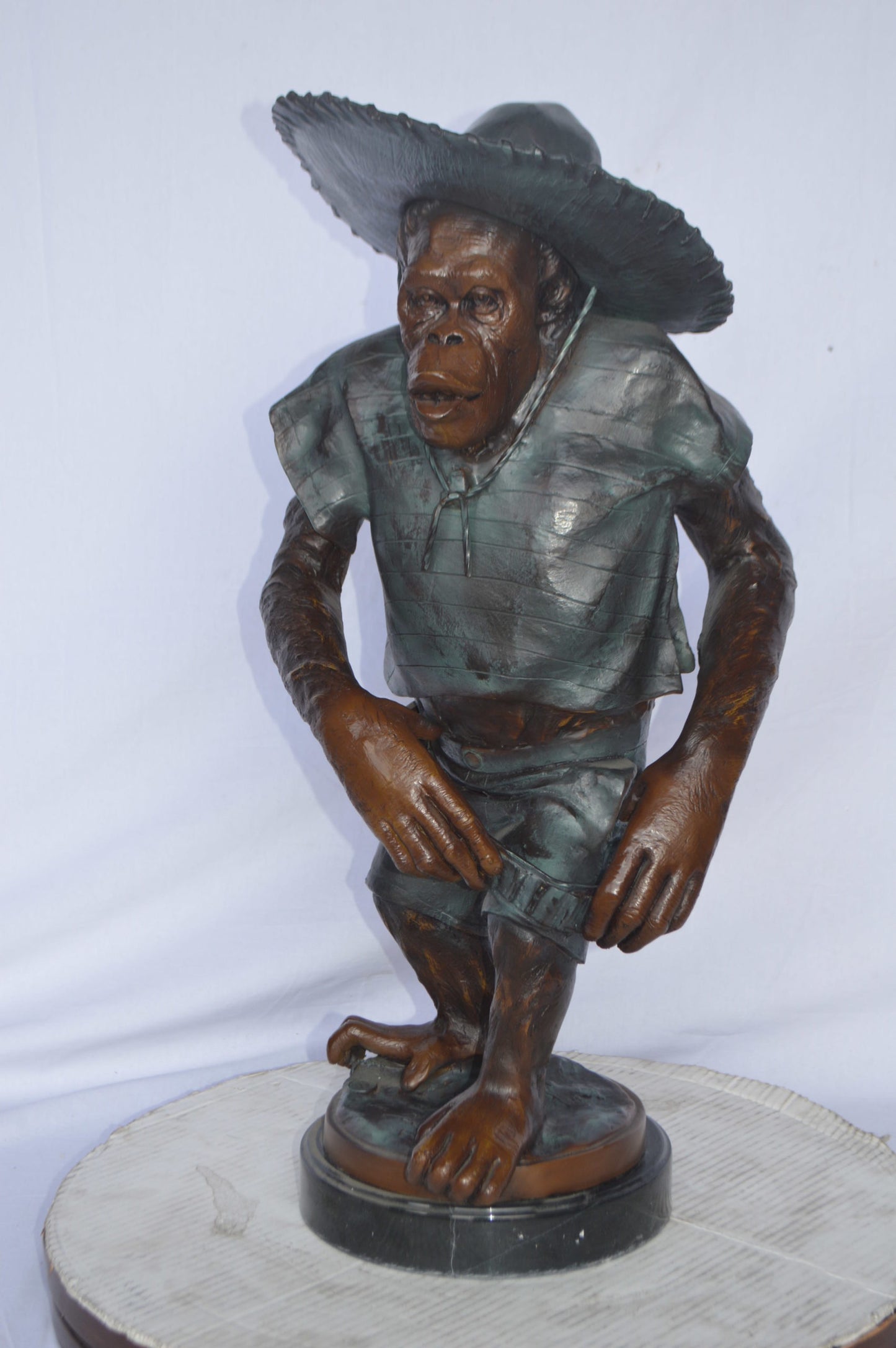 Monkey Cowboy bronze statue - Size: 14"L x 12"W x 29"H.