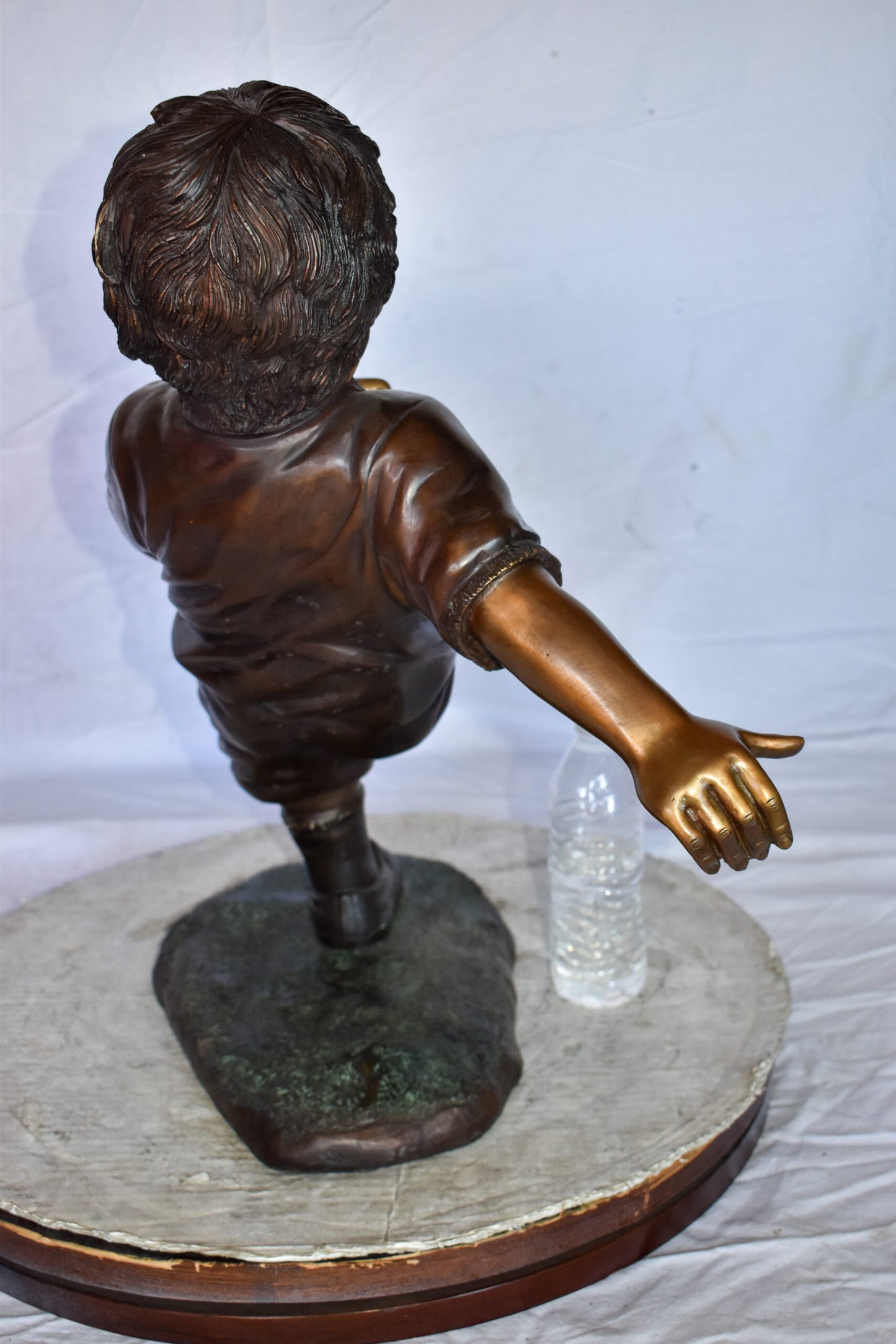 Young Boy Passionately Kicking Soccer Ball Bronze Statue  Size: 26" x 16" x 24"H