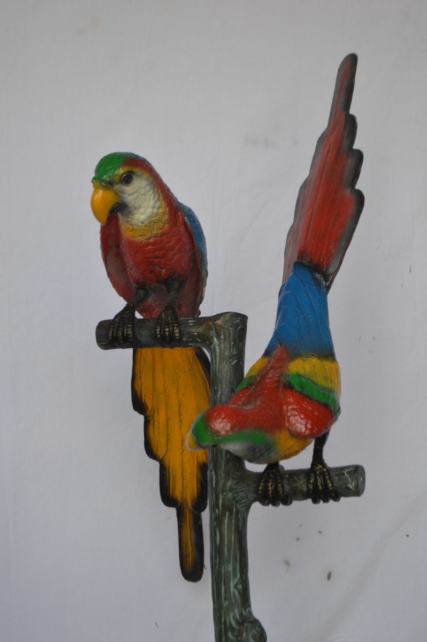 Two parrots on a tree bronze statue - Size: 16"L x 22"W x 52"H.