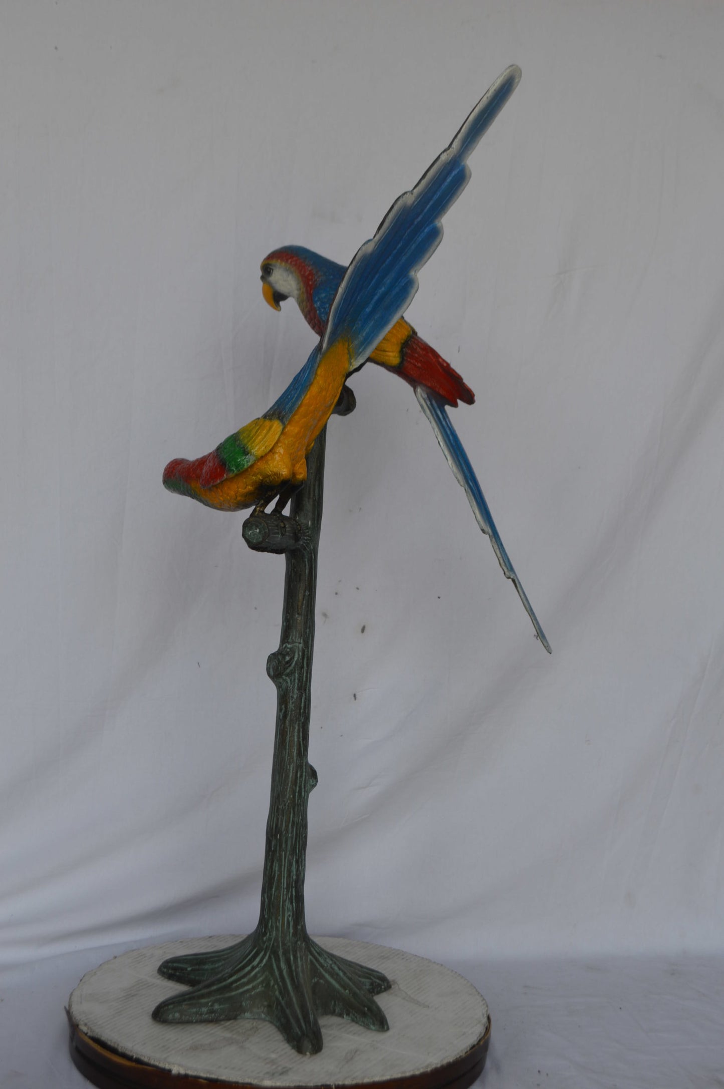 Two parrots on a tree bronze statue - Size: 16"L x 22"W x 52"H.