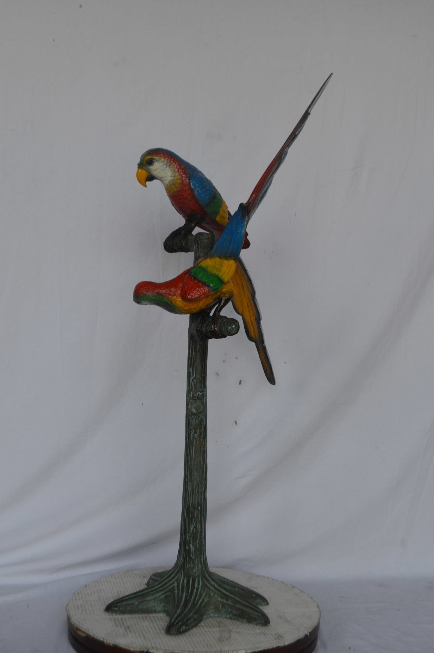 Two parrots on a tree bronze statue - Size: 16"L x 22"W x 52"H.
