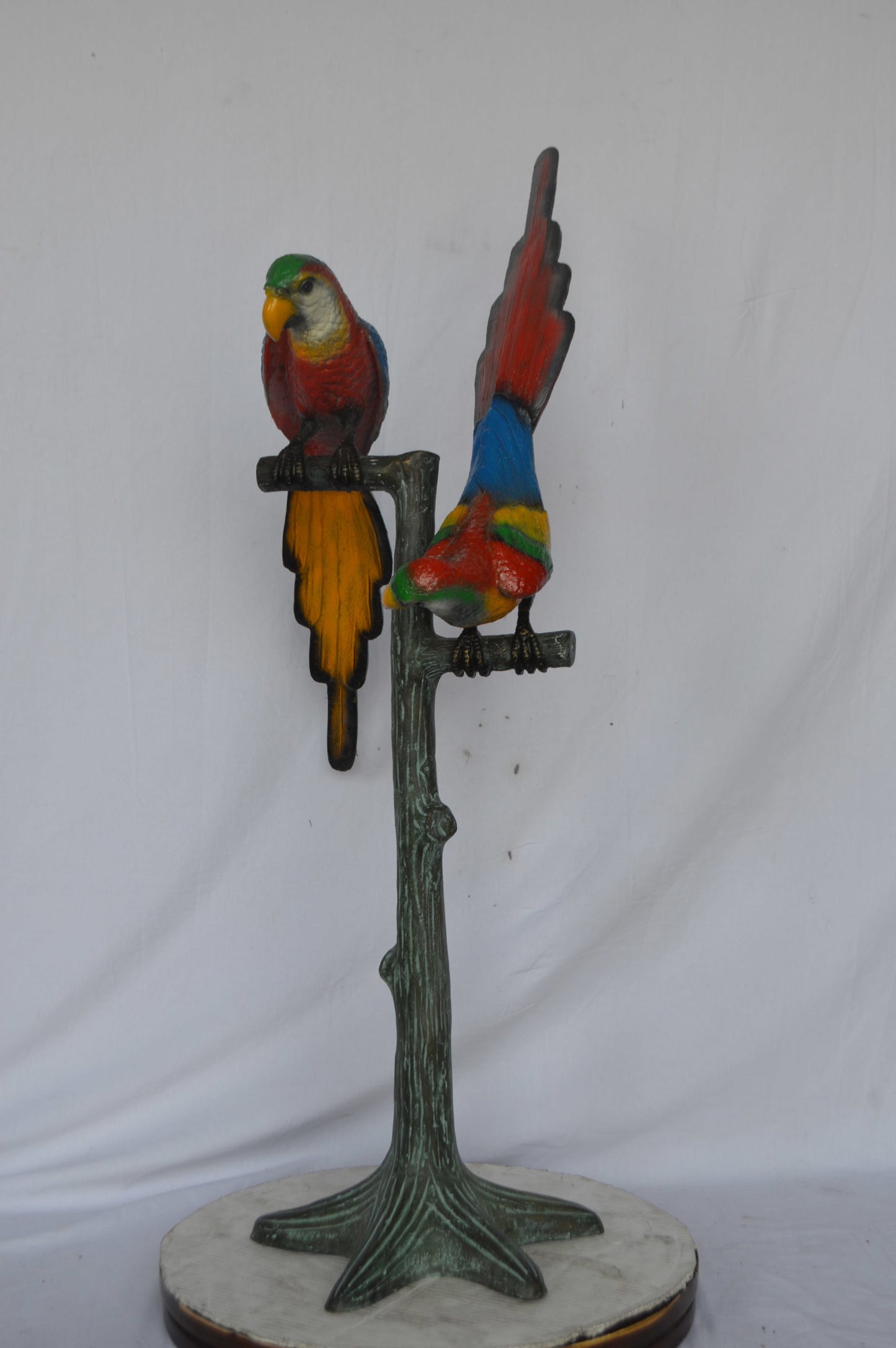 Two parrots on a tree bronze statue - Size: 16"L x 22"W x 52"H.