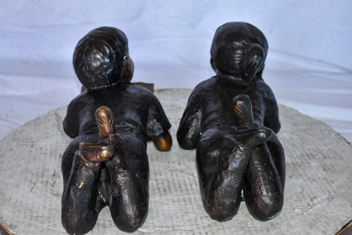 Young Kids Laying and Reading Cheerfully Bronze Statue Set Size: 20" x 13" x 8"H
