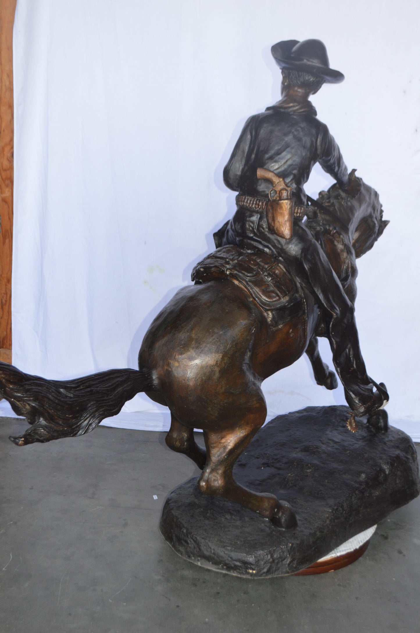 Giant Cowboy Remington bronze statue - Size: 66"L x 30"W x 58"H.
