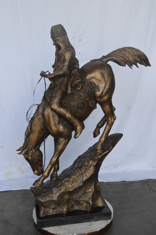 Giant mountain man Remington Replica bronze statue - Size: 37"L x 13"W x 54"H.