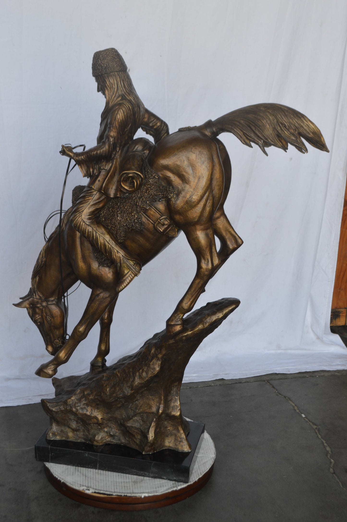Giant mountain man Remington Replica bronze statue - Size: 37"L x 13"W x 54"H.