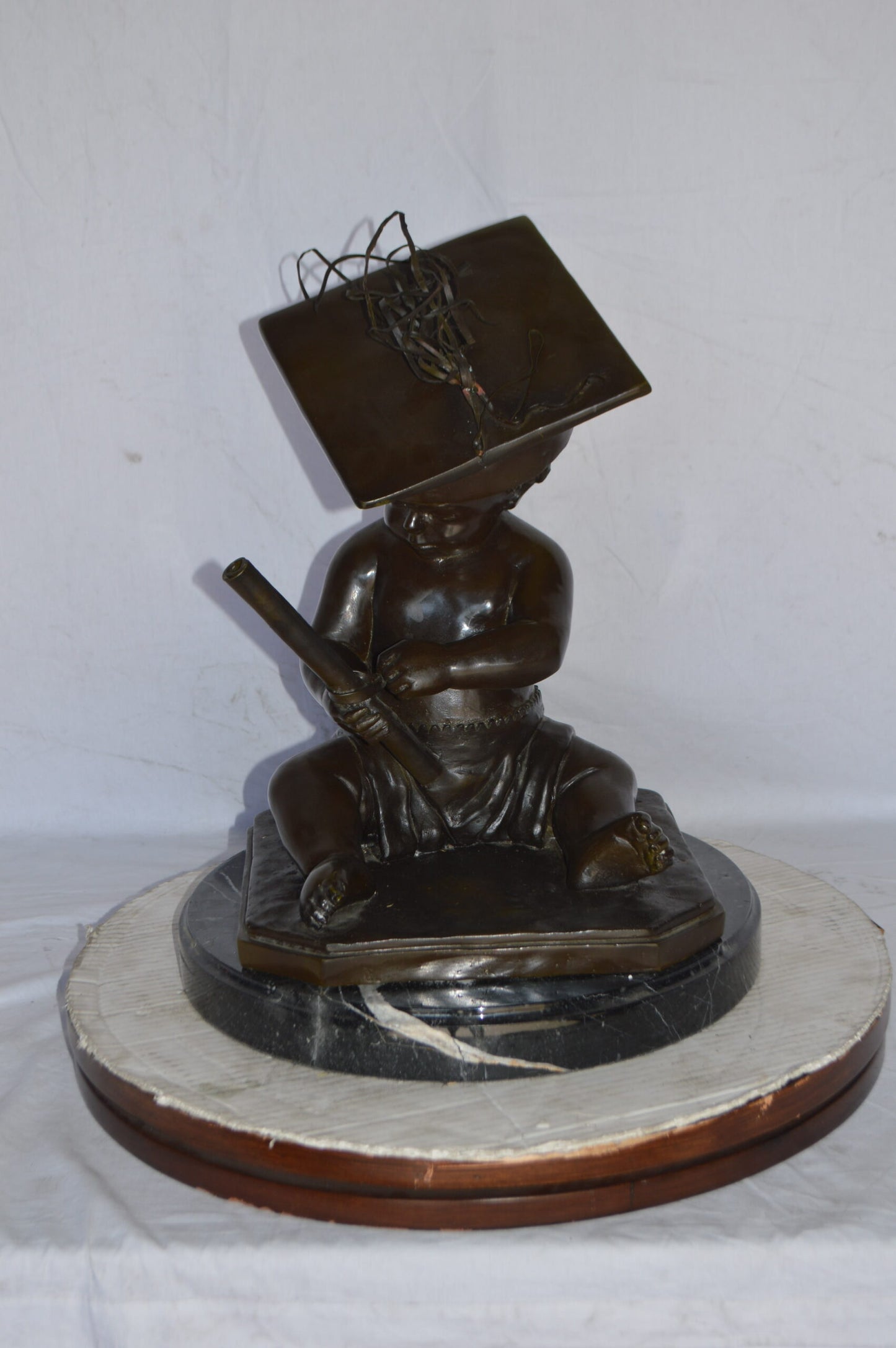 Graduating baby bronze statue - Size: 16"L x 16"W x 21"H.