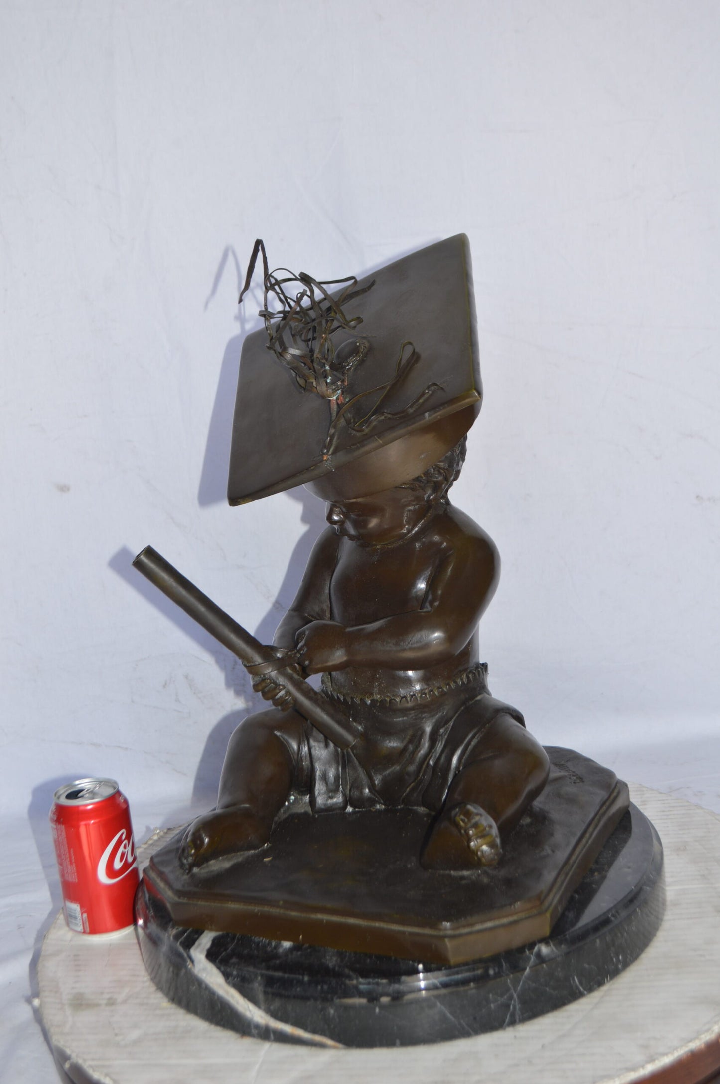 Graduating baby bronze statue - Size: 16"L x 16"W x 21"H.
