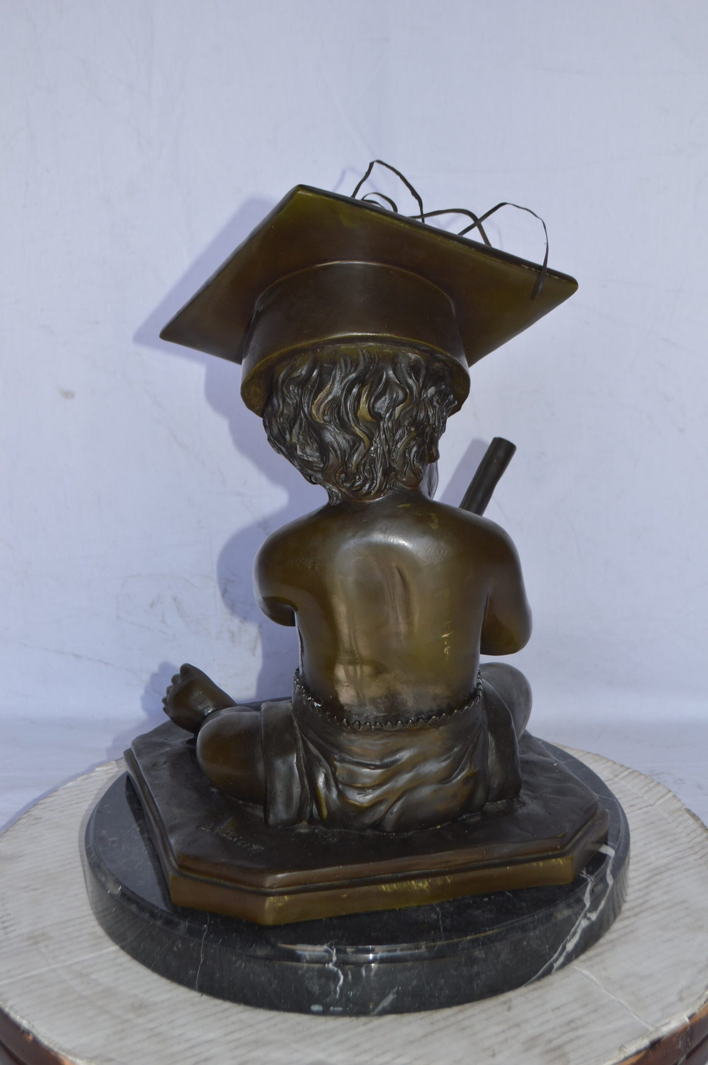 Graduating baby bronze statue - Size: 16"L x 16"W x 21"H.