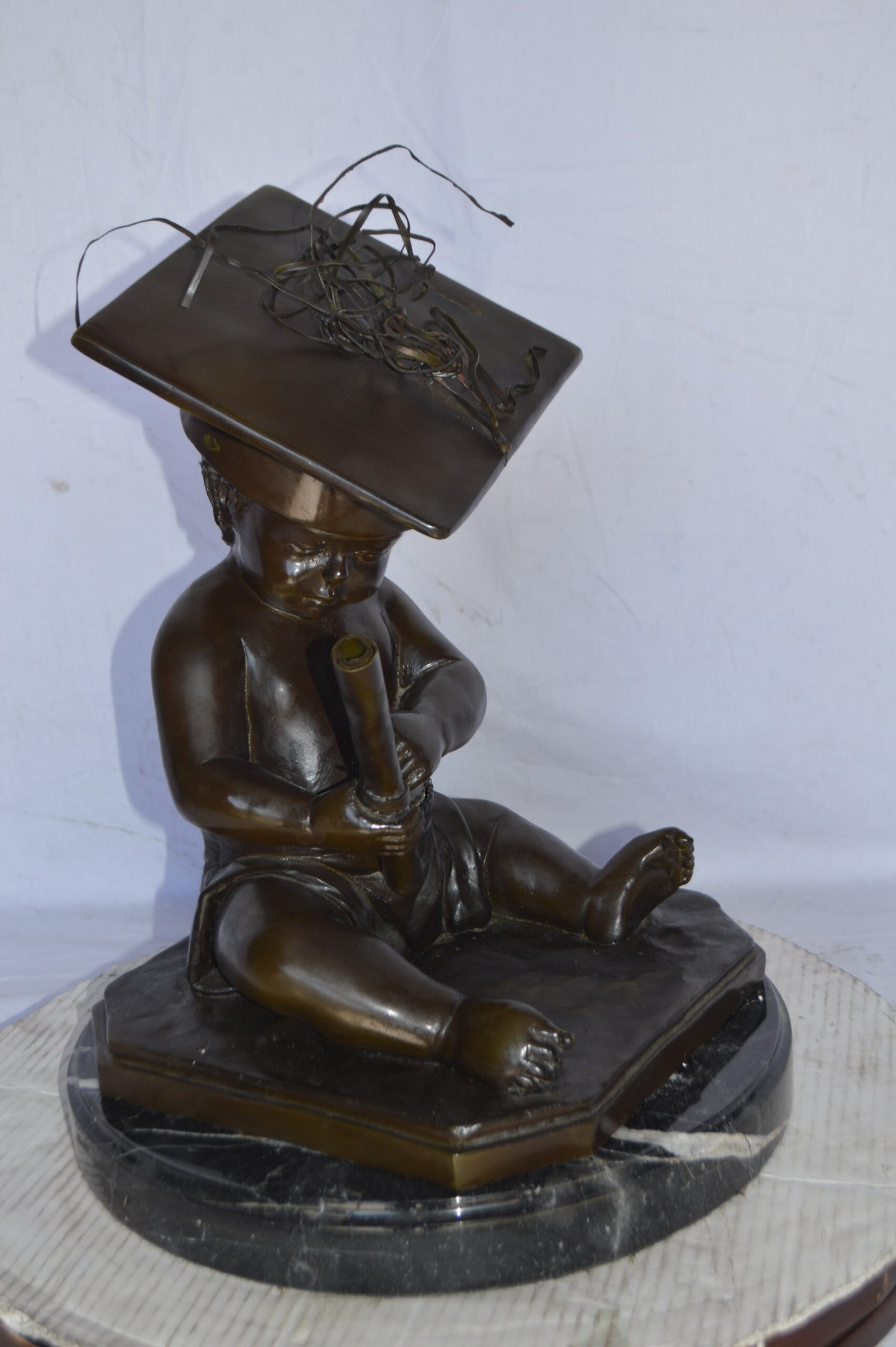 Graduating baby bronze statue - Size: 16"L x 16"W x 21"H.