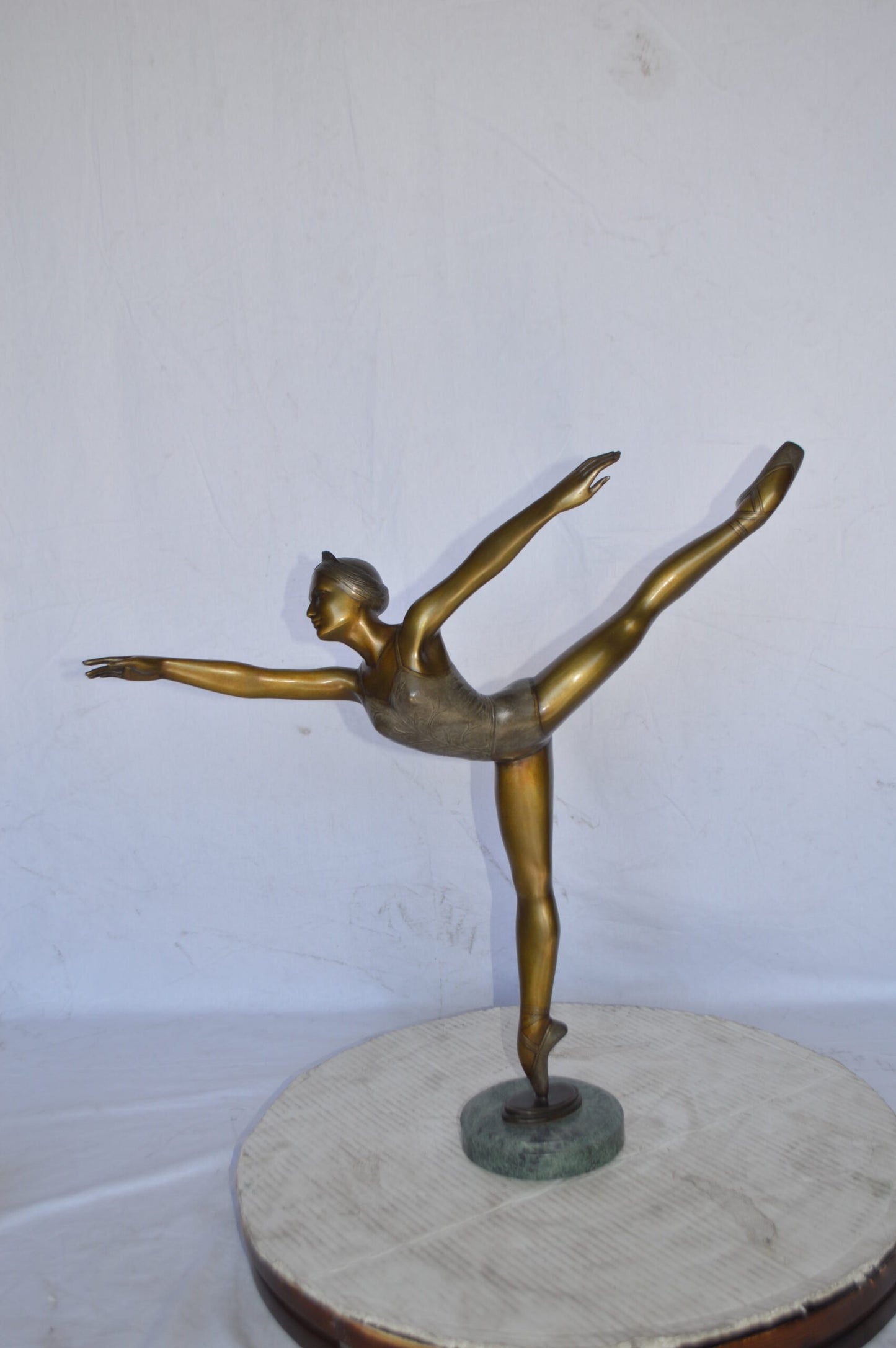 Ballerina Dancing in Action Bronze Statue - Size: 25"L x 8"W x 29"H.