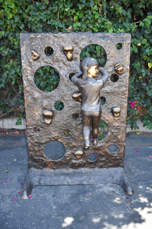 Young Girl Playing on A Climbing Wall Bronze Statue Life Size 44" x 26" x 57"H