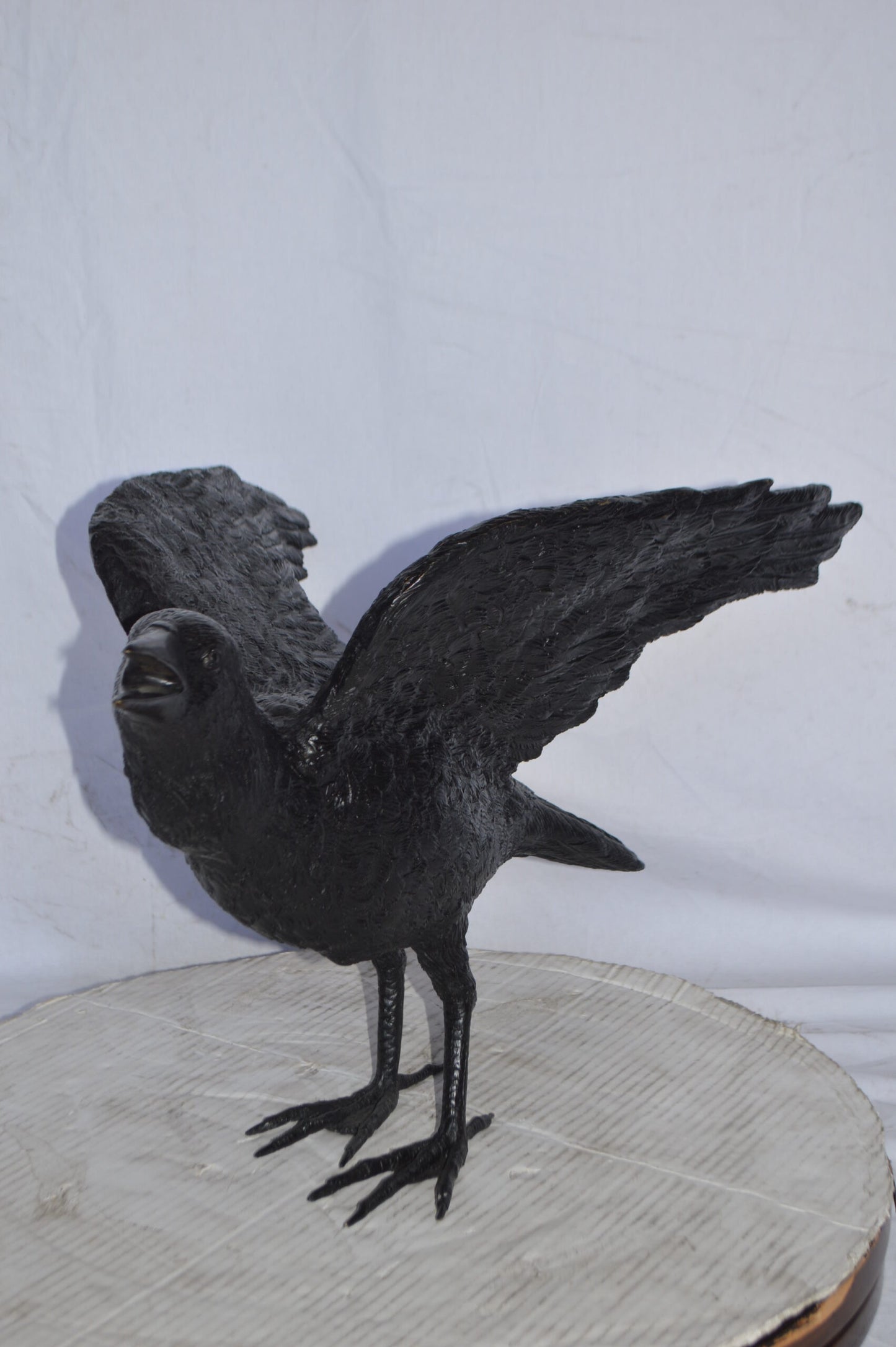 Raven with Open Wings Bronze Statue - Size: 16"L x 25"W x 15"H.
