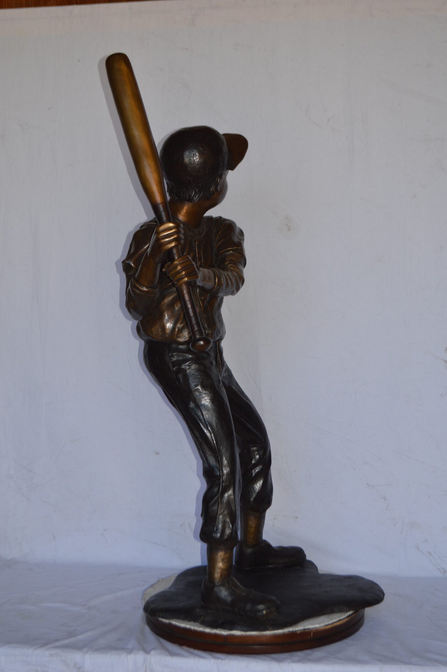 Baseball batter in Action Bronze Statue - Size: 28"L x 24"W x 57"H.