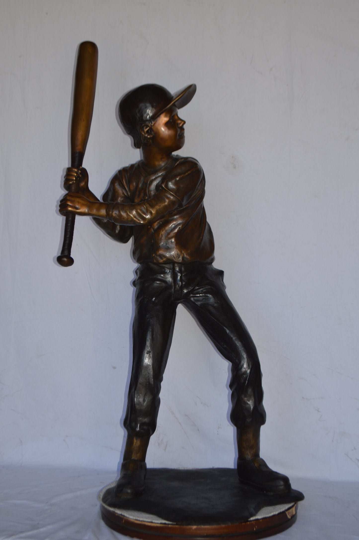 Baseball batter in Action Bronze Statue - Size: 28"L x 24"W x 57"H.