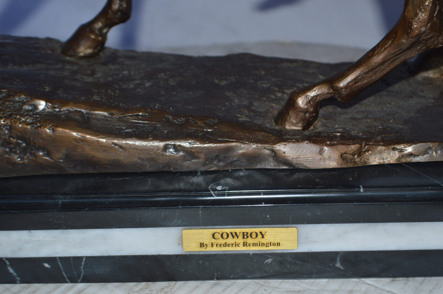 Cowboy Bronze replica by Fredric Remington - Size: 25"L x 9"W x 23"H.