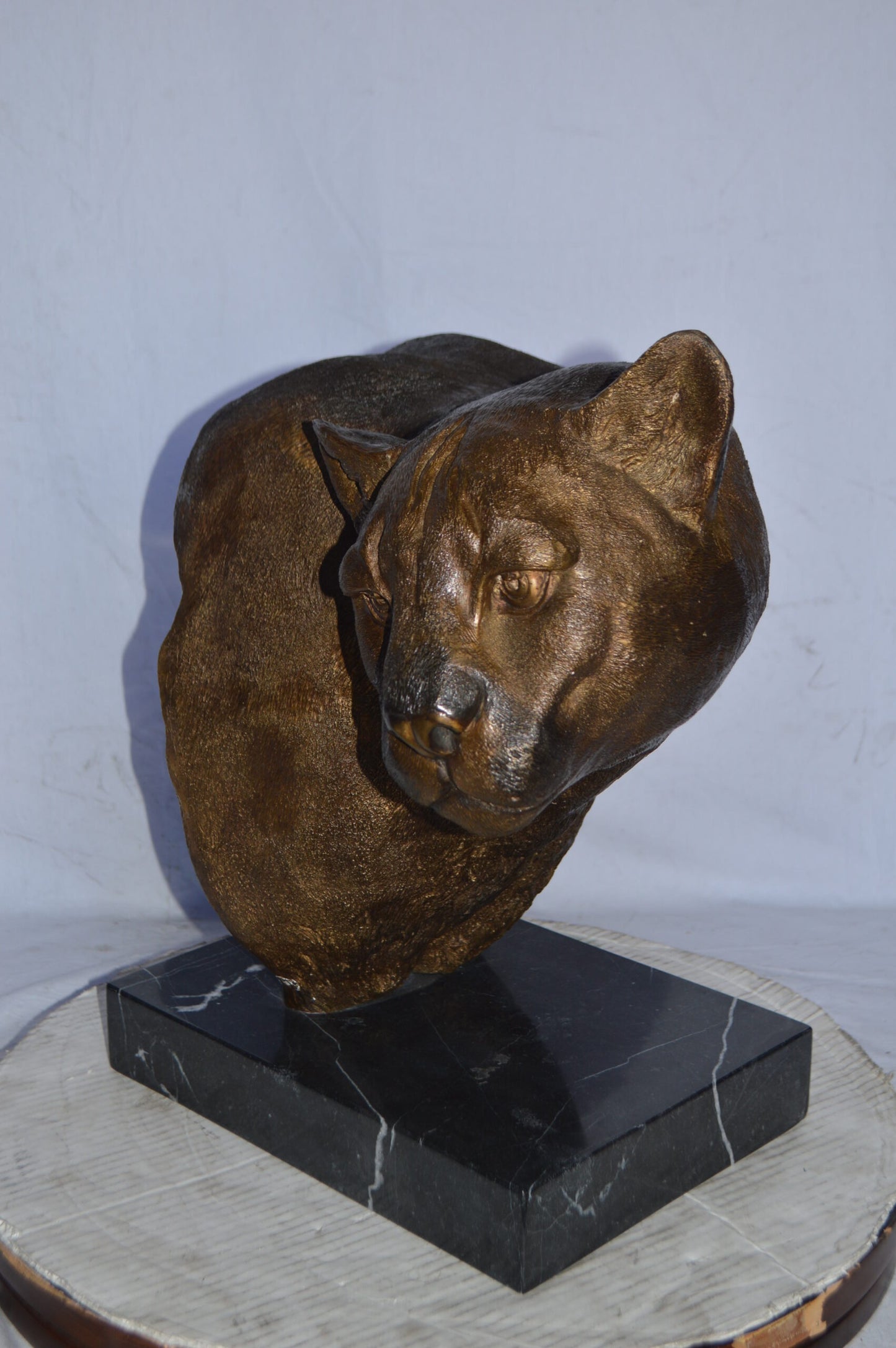 Mountain Lion Head bronze statue on a marble base - Size: 18"L x 15"W x 21"H.