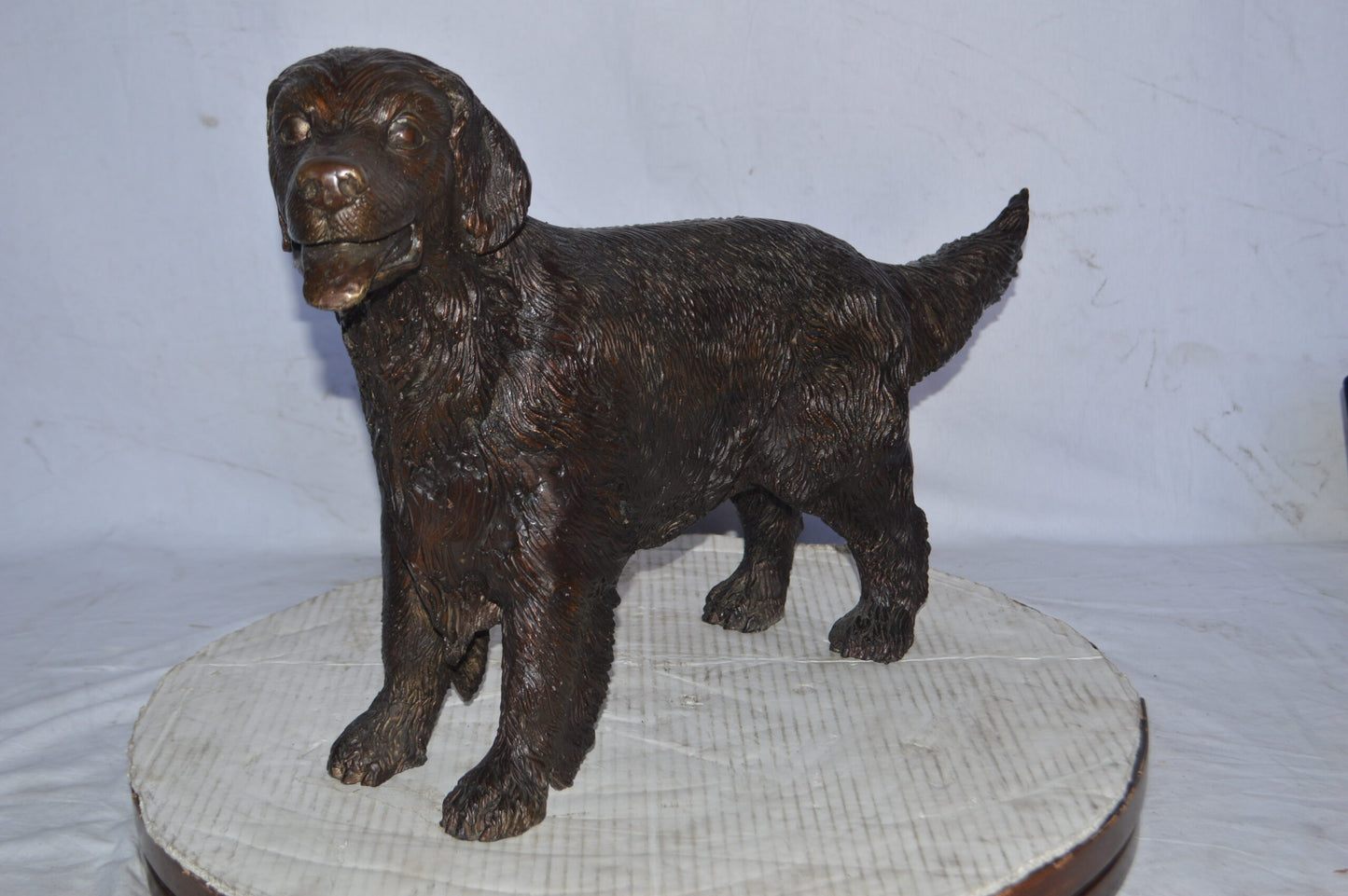Golden Retriever dog bronze statue - Size: 26"L x 7"W x 16"H.