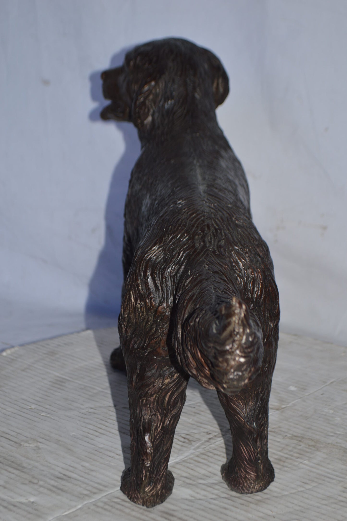 Golden Retriever dog bronze statue - Size: 26"L x 7"W x 16"H.