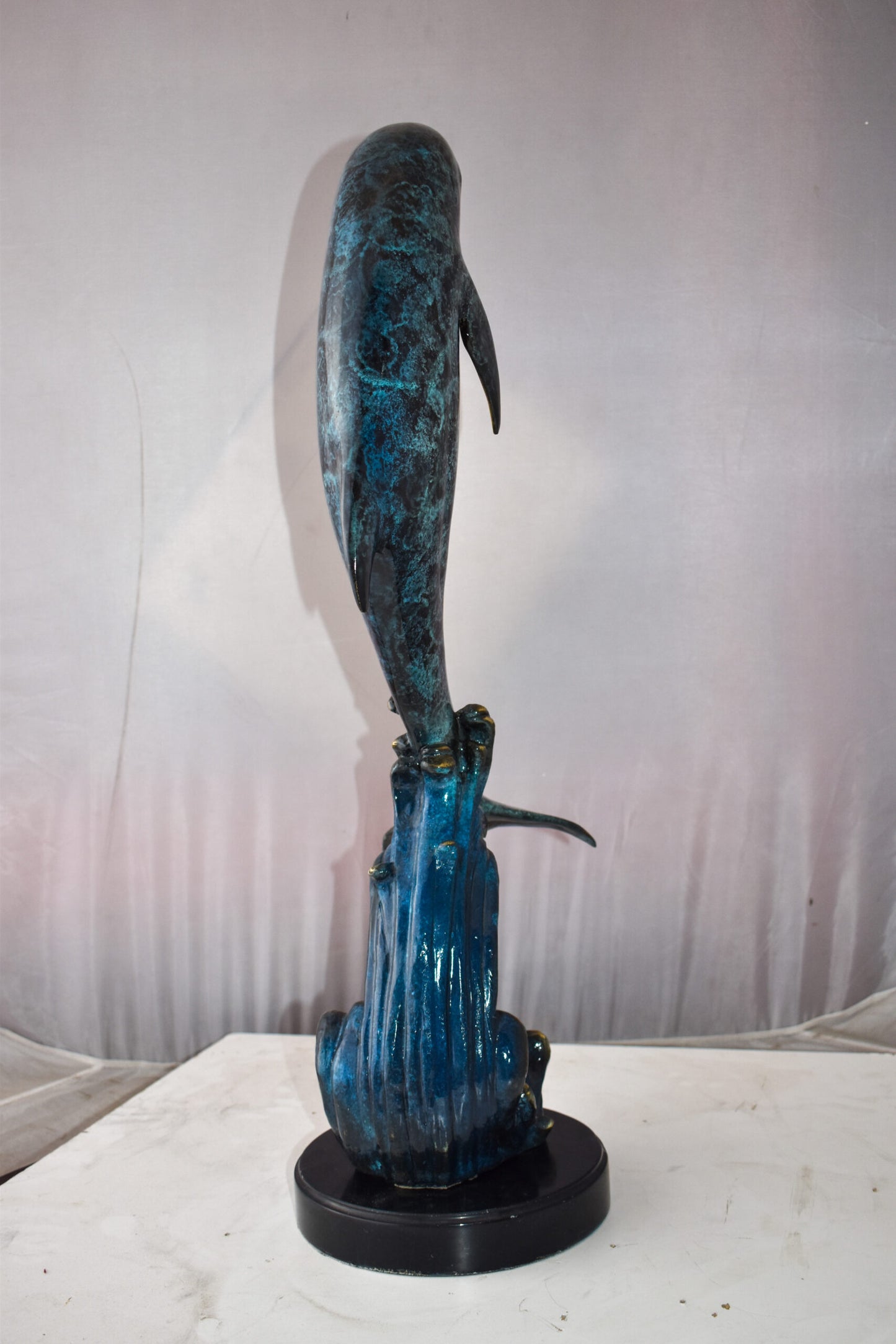 Dolphin Jumping the Waves Colored Bronze Statue Size: 15" x 10" x 31"H
