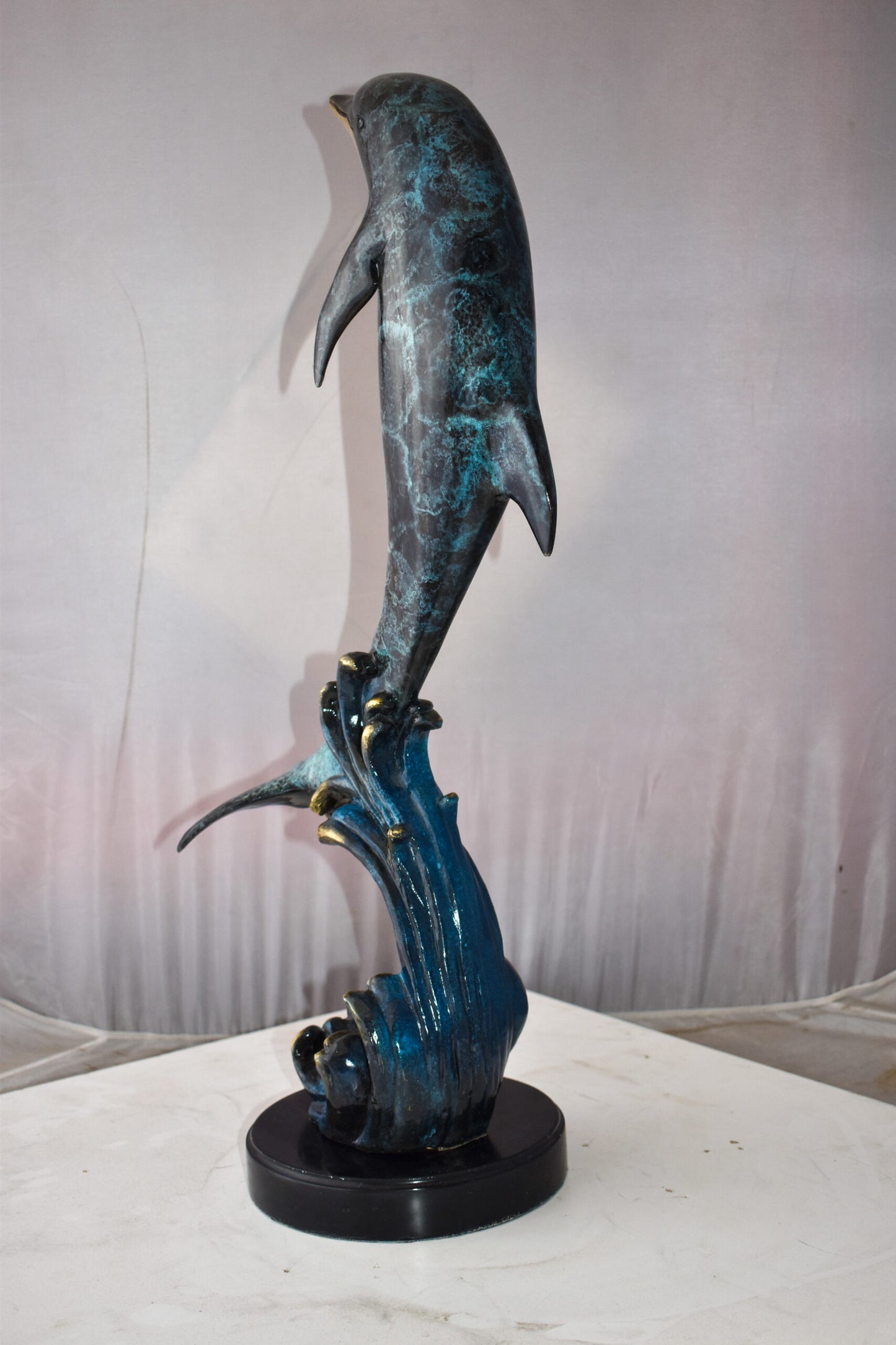 Dolphin Jumping the Waves Colored Bronze Statue Size: 15" x 10" x 31"H