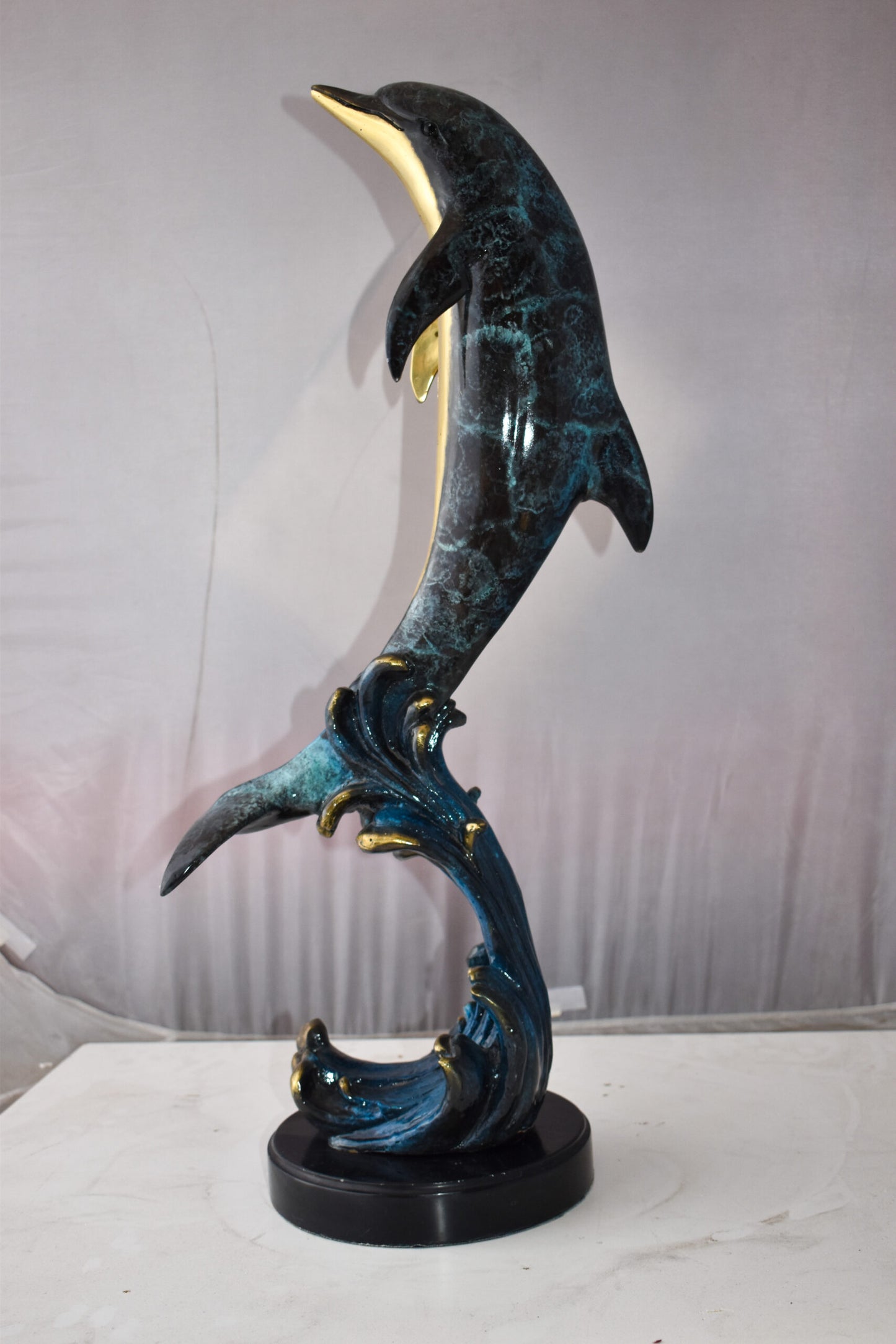 Dolphin Jumping the Waves Colored Bronze Statue Size: 15" x 10" x 31"H
