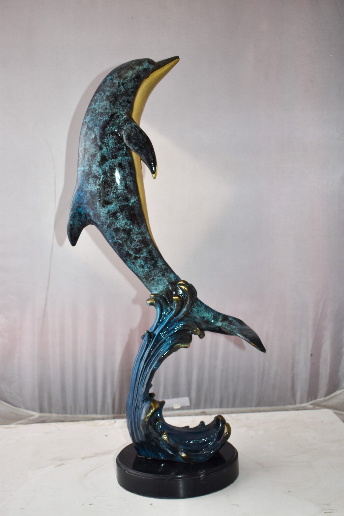 Dolphin Jumping the Waves Colored Bronze Statue Size: 15" x 10" x 31"H