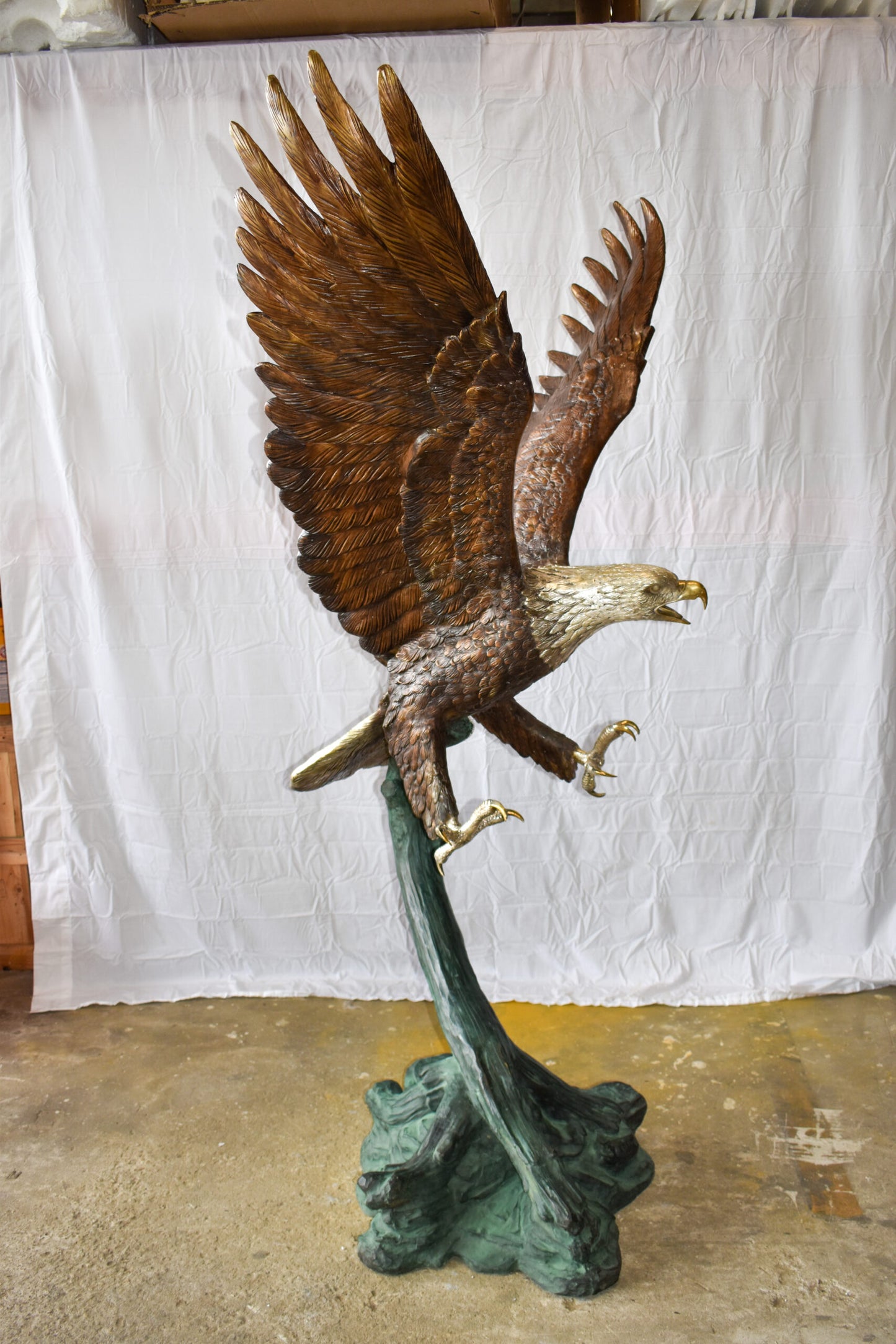 Giant Eagle in Action Looking for Prey Bronze Statue Size: 60" x 40" x 78"H