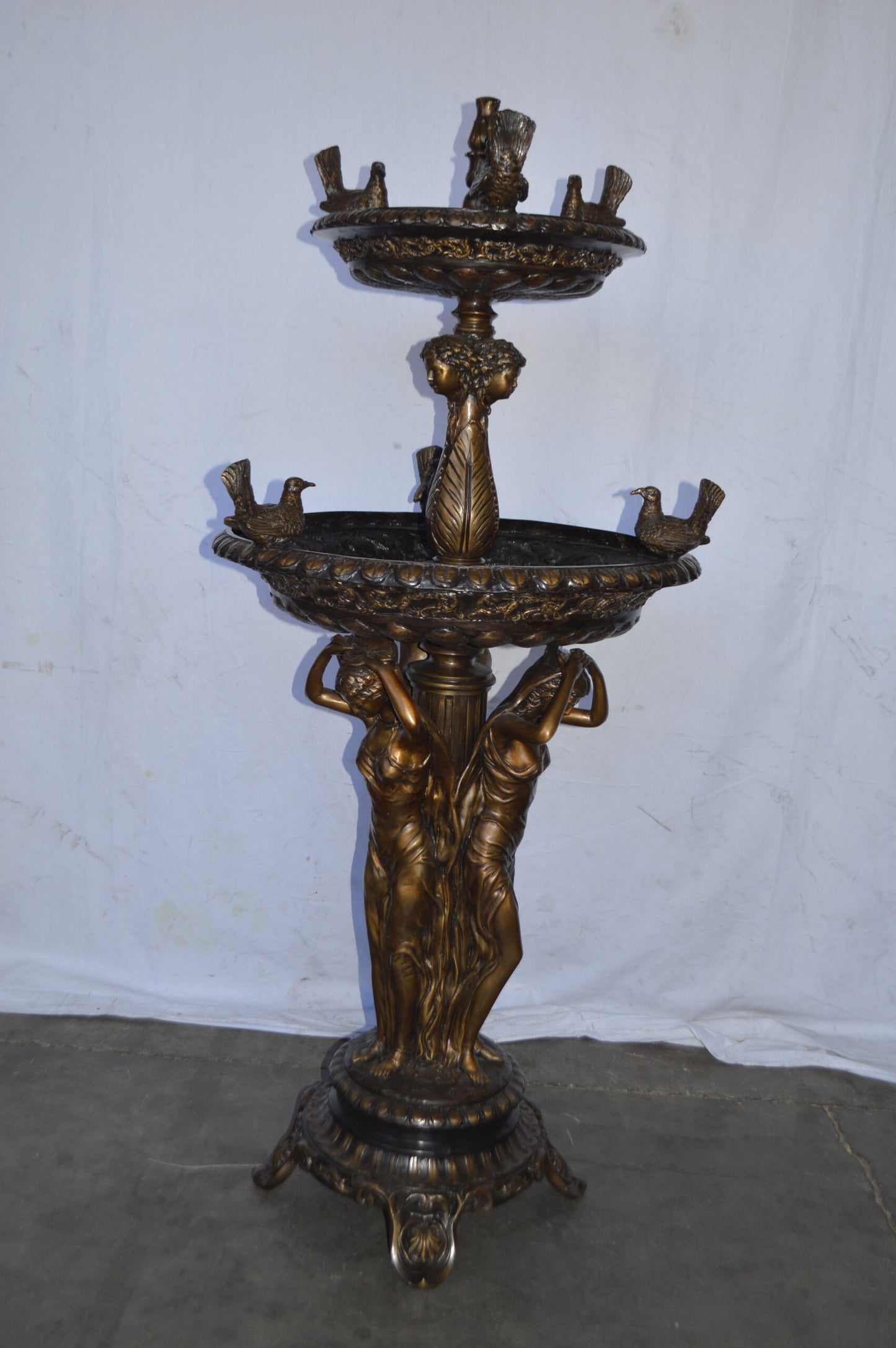 Large bronze water fountain with girls and birds - Size: 28"L x 28"W x 65"H.