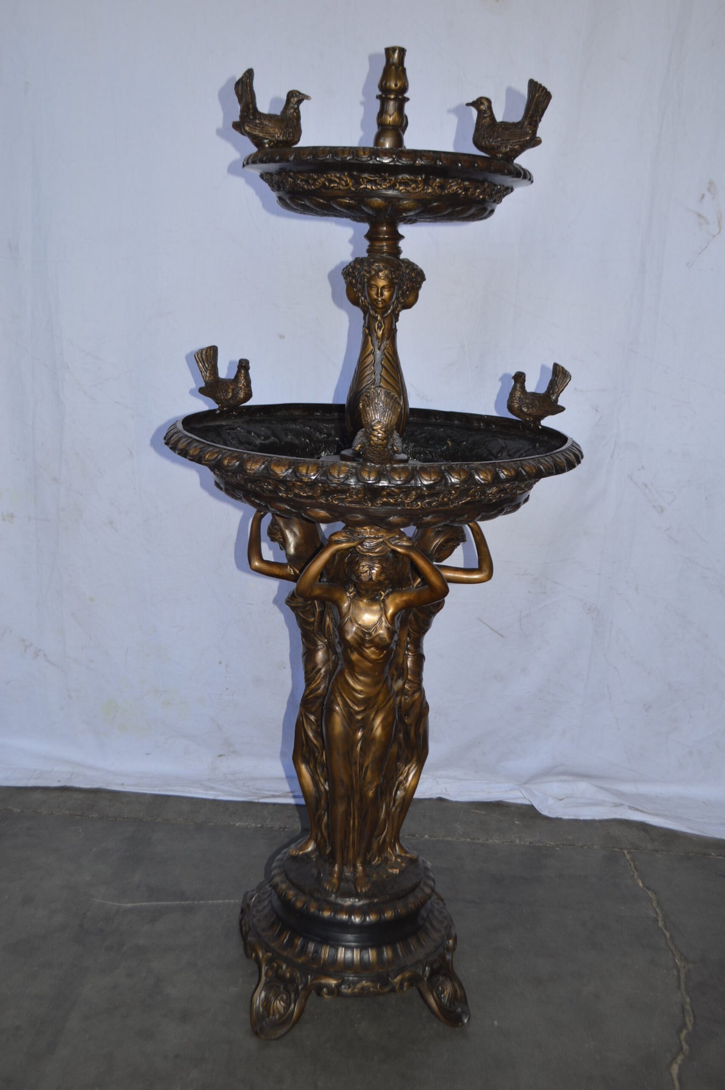Large bronze water fountain with girls and birds - Size: 28"L x 28"W x 65"H.