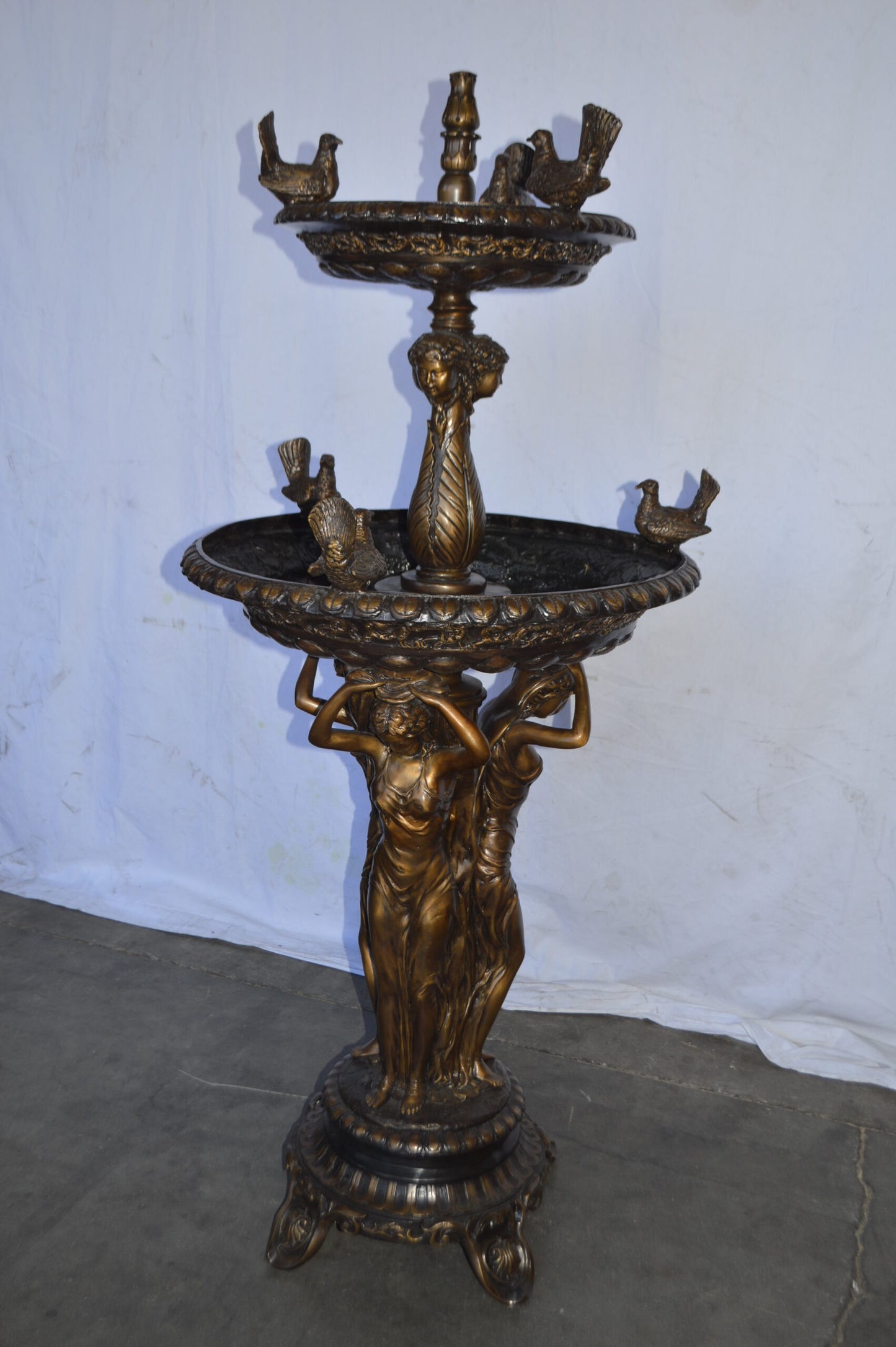 Large bronze water fountain with girls and birds - Size: 28"L x 28"W x 65"H.
