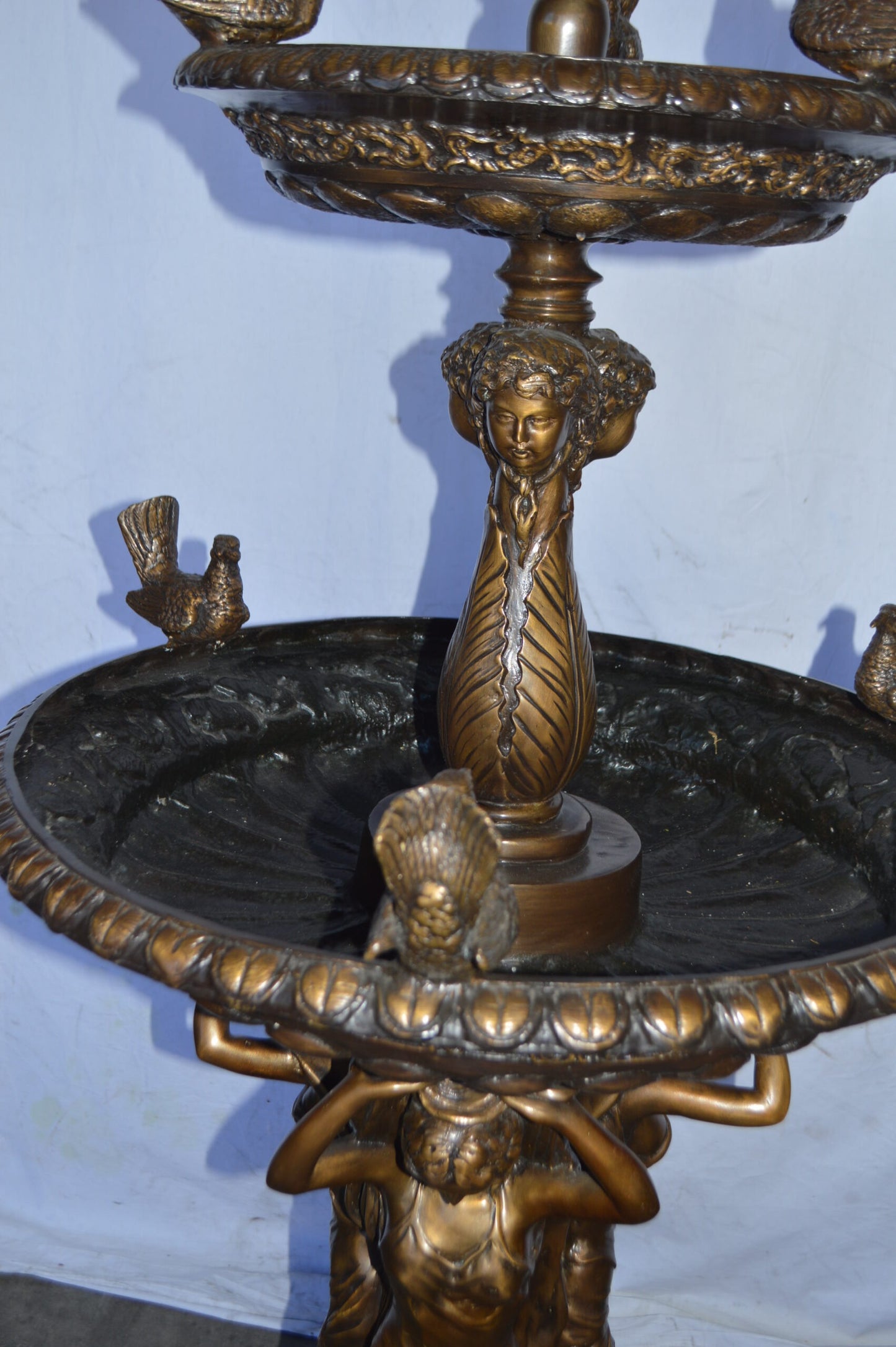 Large bronze water fountain with girls and birds - Size: 28"L x 28"W x 65"H.