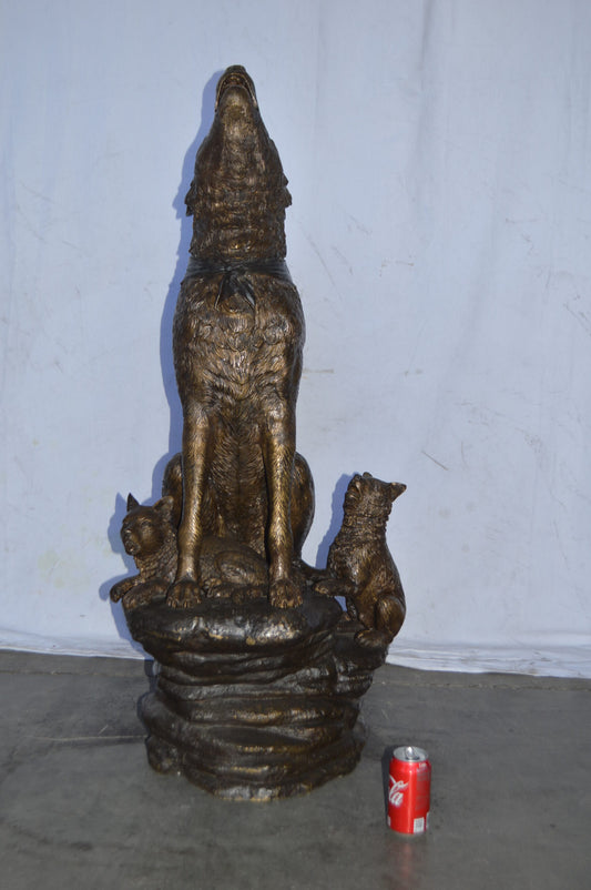 Wolf and her Cubs howling Bronze Statue - Size: 23"L x 20"W x 48"H.