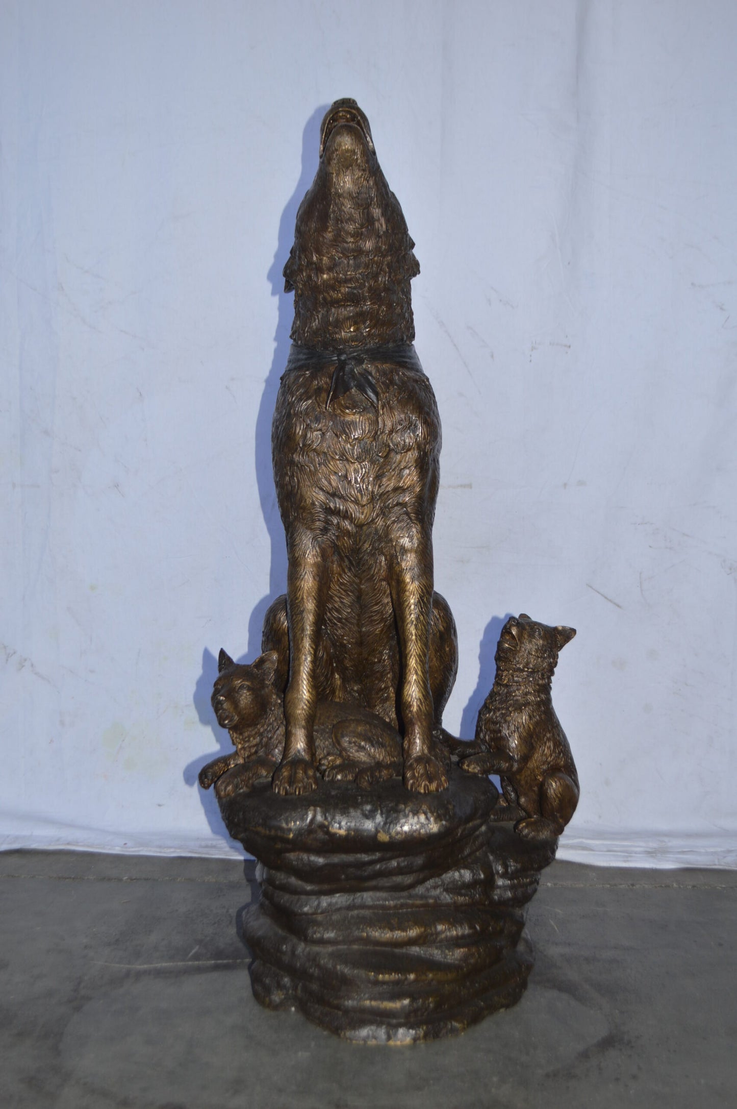 Wolf and her Cubs howling Bronze Statue - Size: 23"L x 20"W x 48"H.